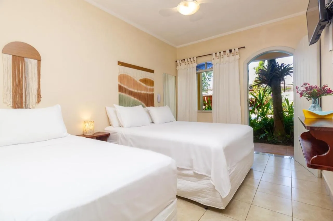 Bed in Pousada Villaggio