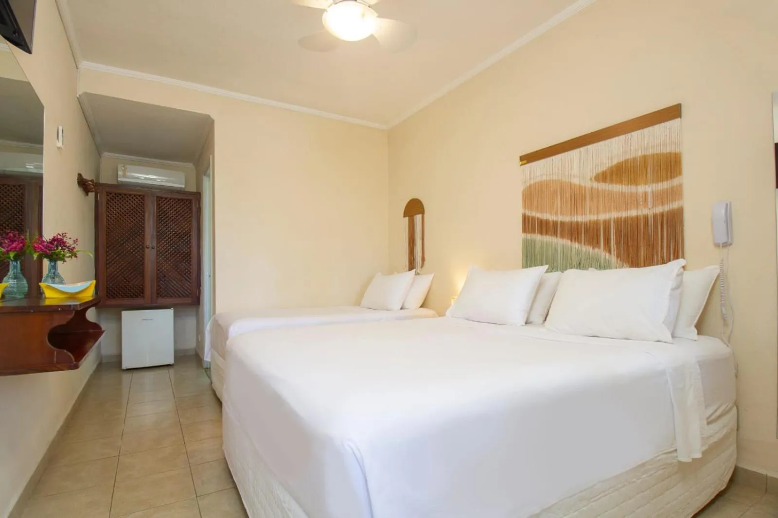 Bed in Pousada Villaggio