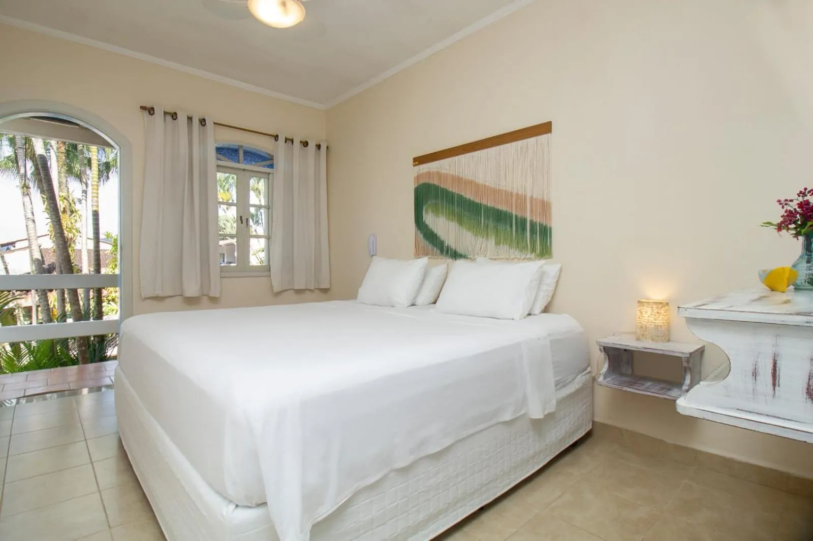Bed in Pousada Villaggio