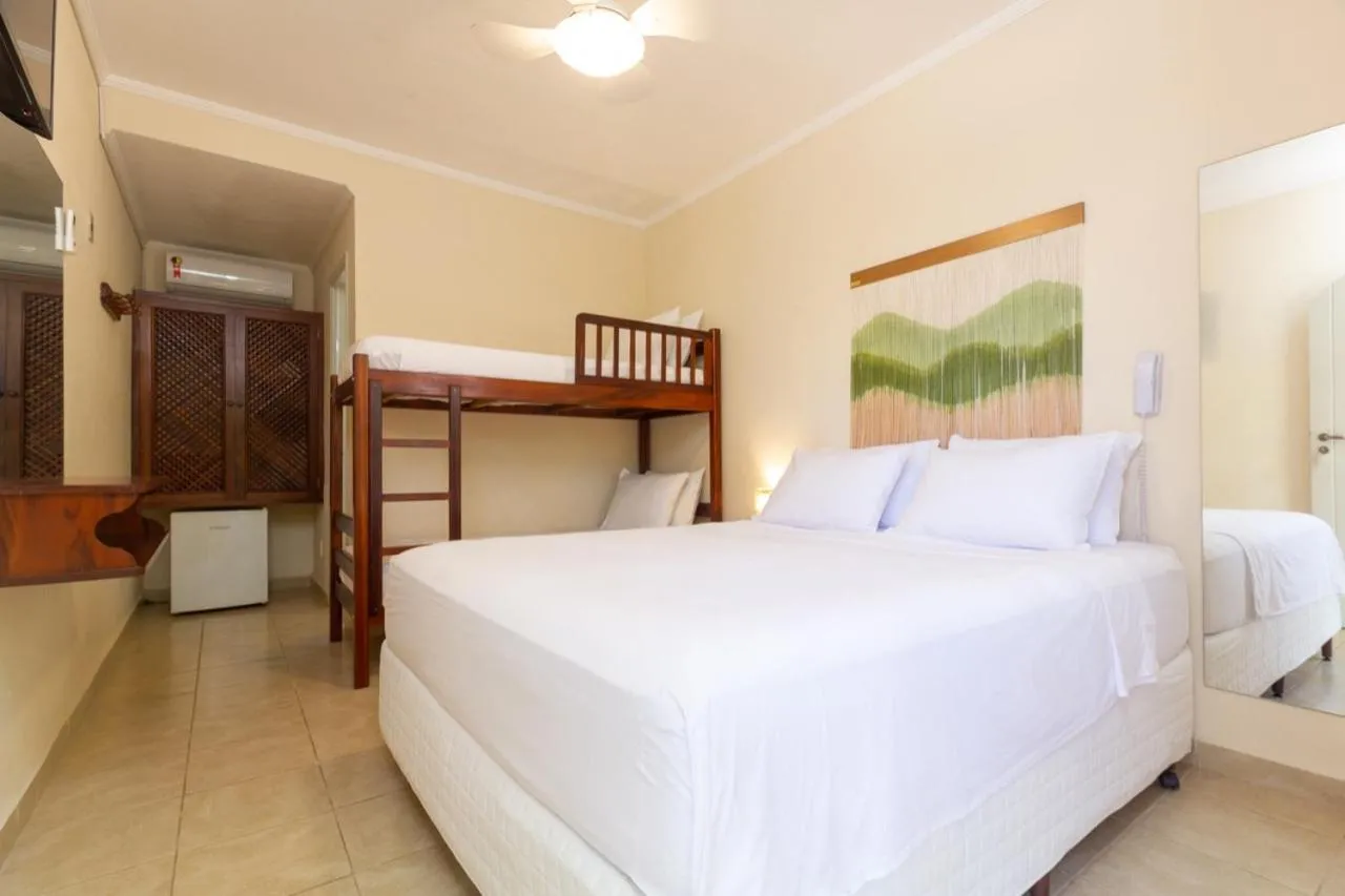 Bed in Pousada Villaggio
