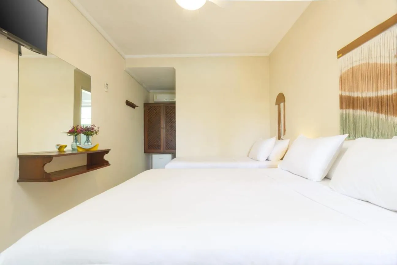 Bed in Pousada Villaggio