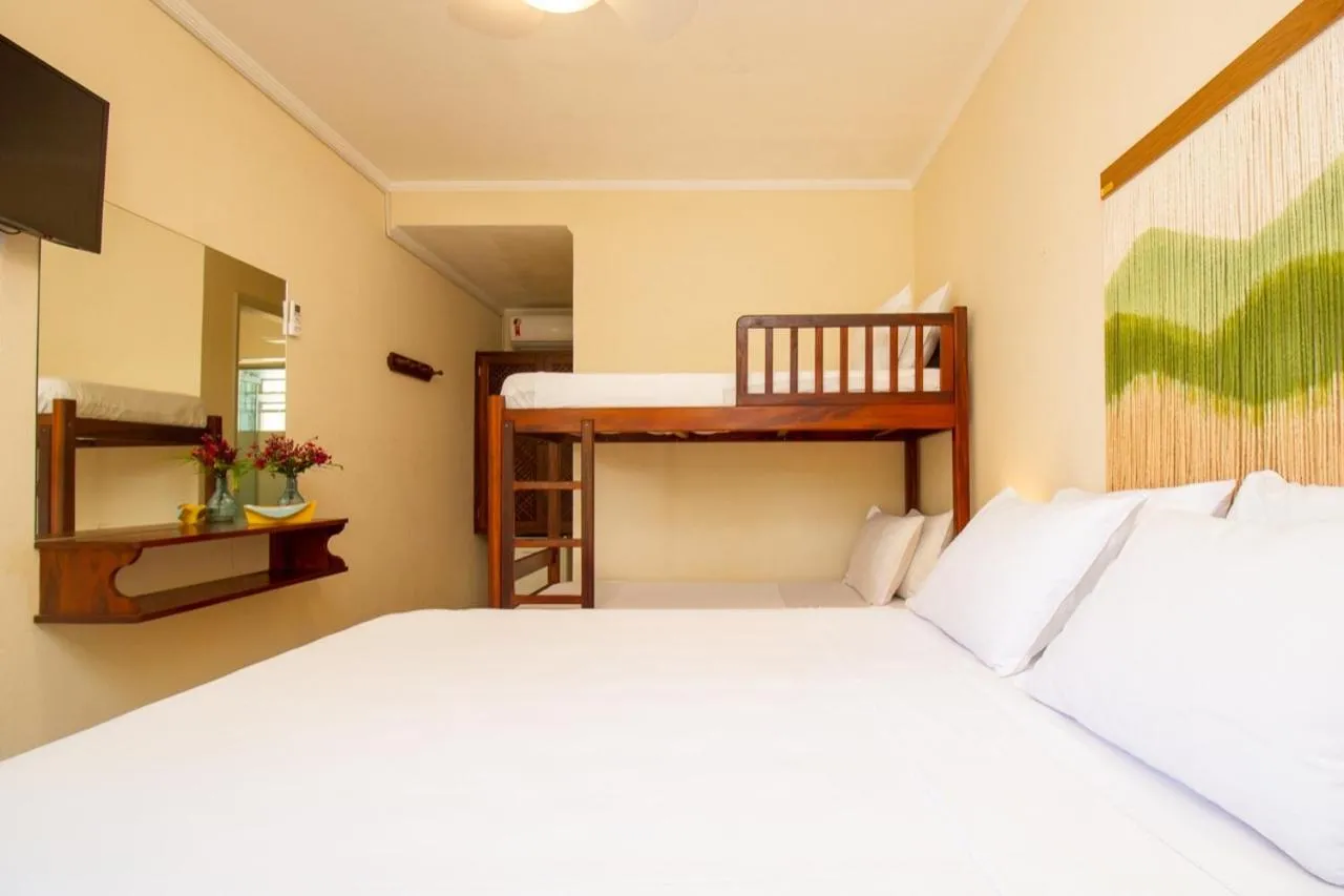 Bed in Pousada Villaggio