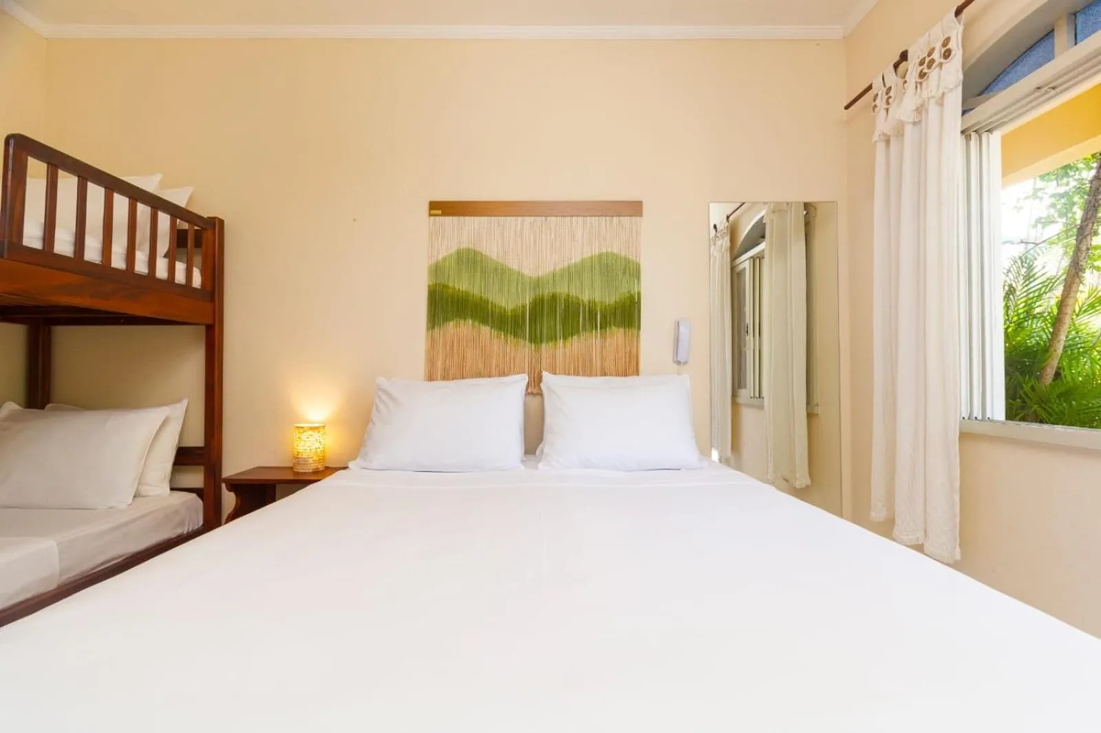 Bed in Pousada Villaggio