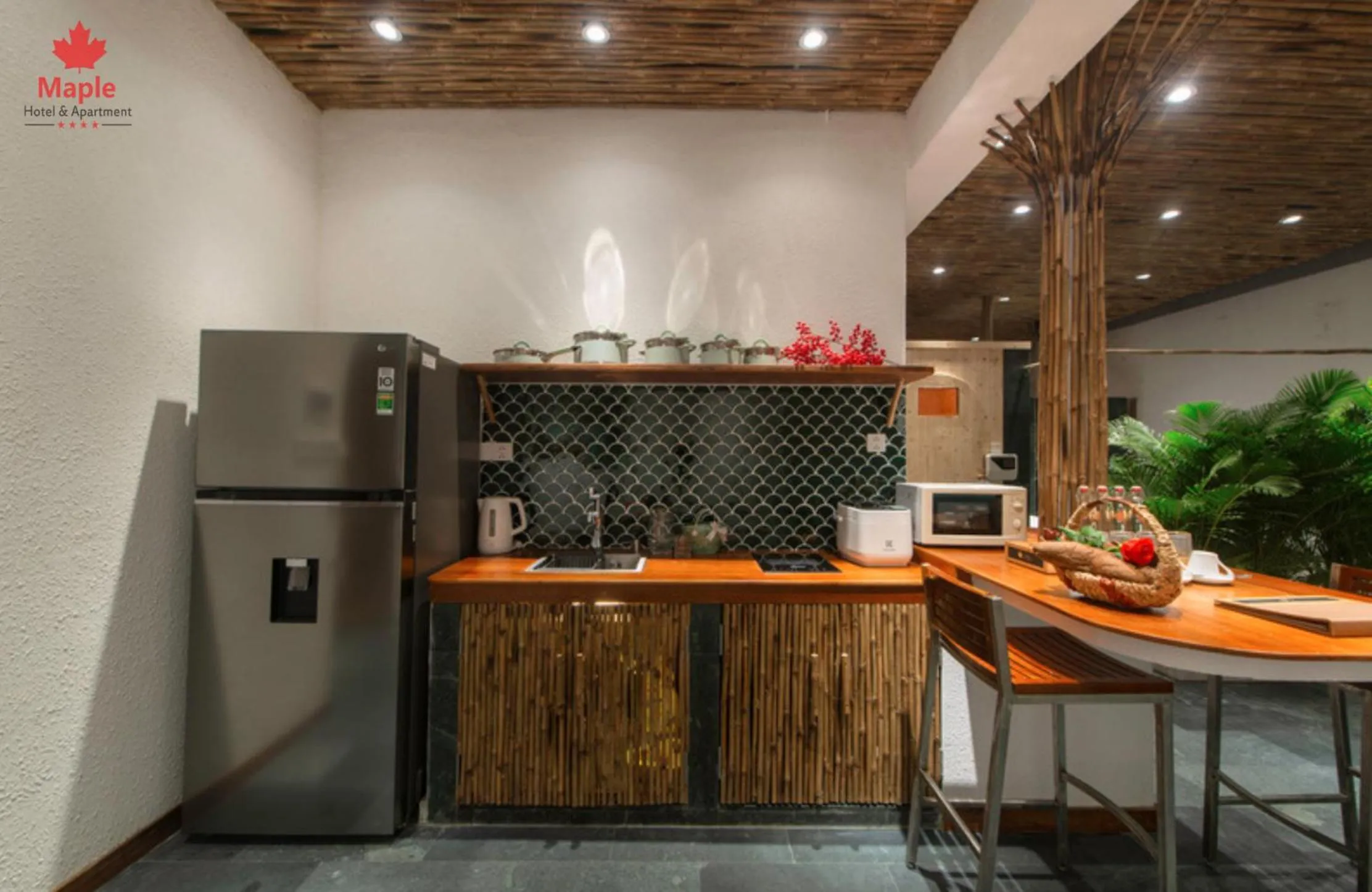 Kitchen or kitchenette in Maple Hotel & Apartment