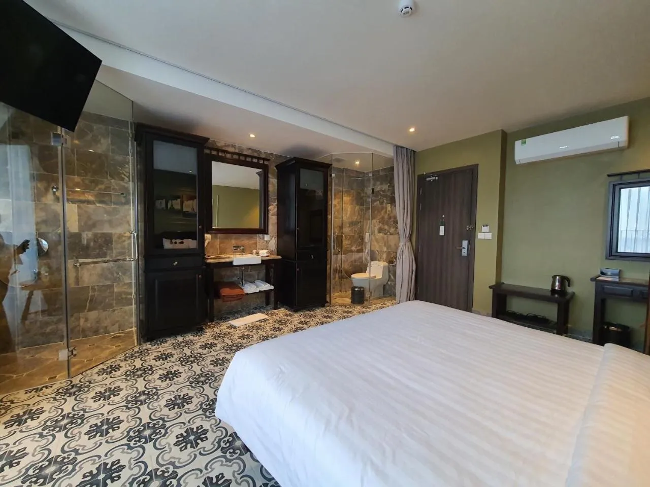 Bed in The Palmy Phu Quoc Resort & Spa