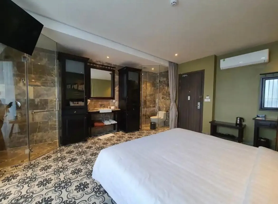 Bed in The Palmy Phu Quoc Resort & Spa