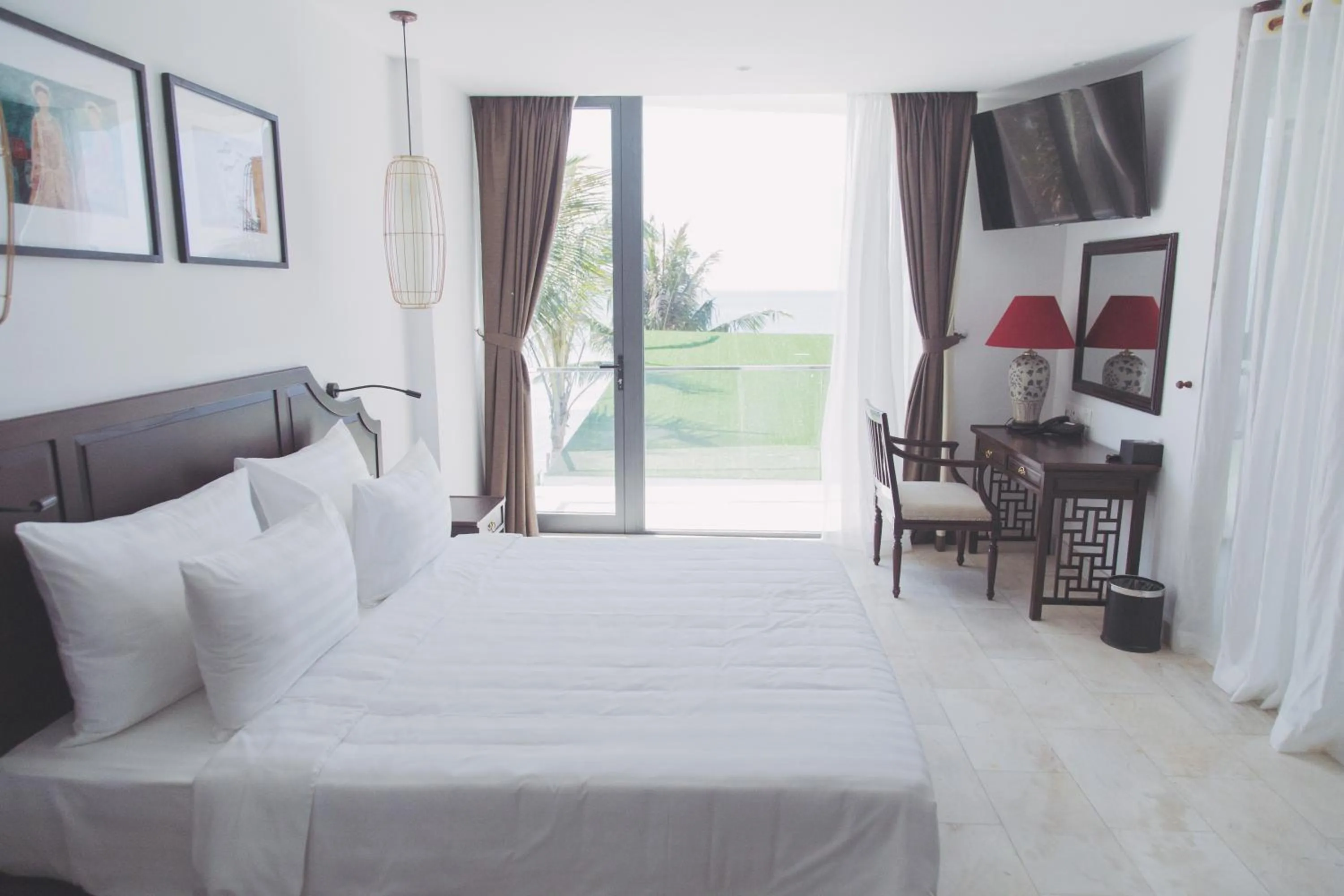Bed in The Palmy Phu Quoc Resort & Spa