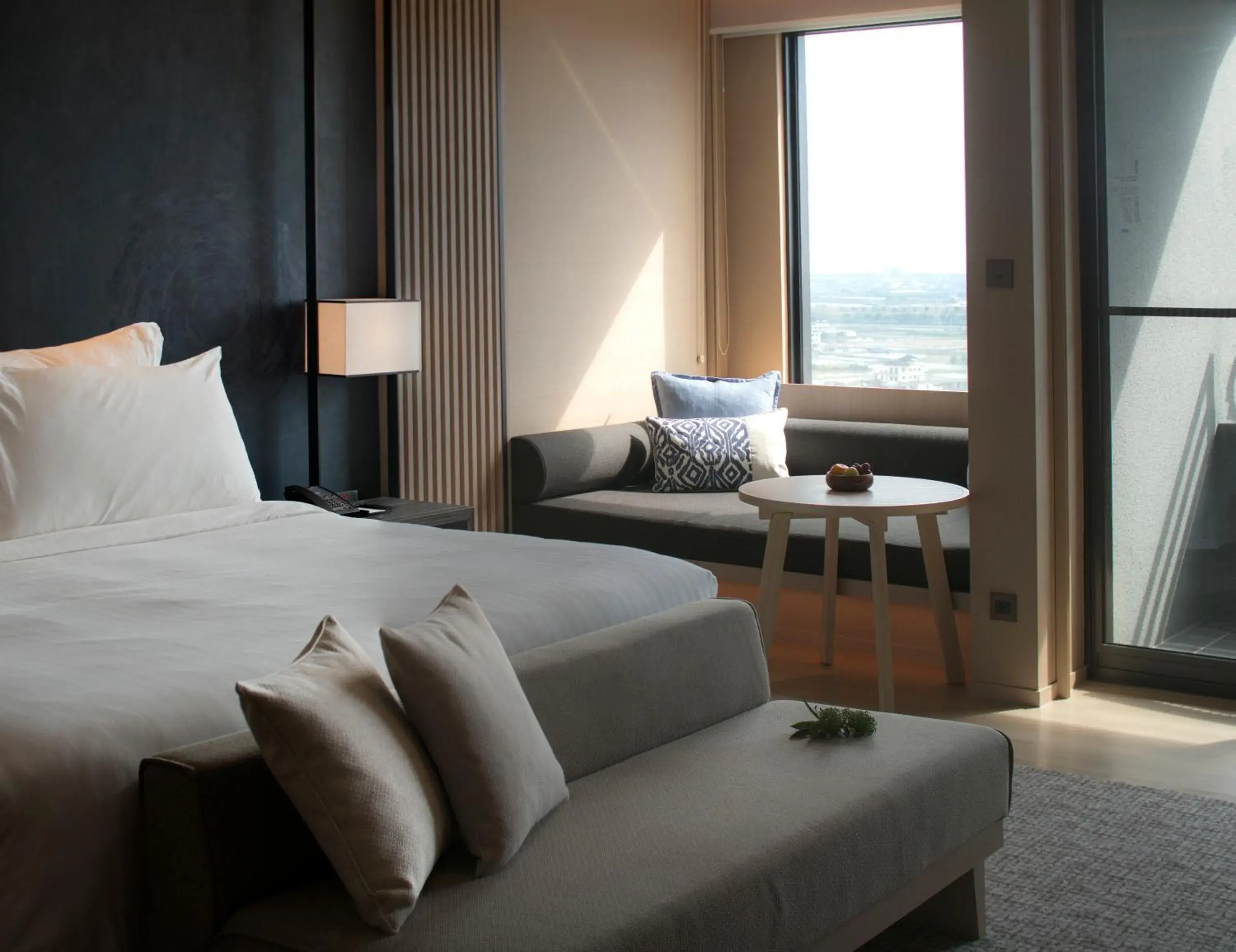 Seating area, Bed in MU Jiaoxi Hotel Seating area, Bed in MU Jiaoxi Hotel