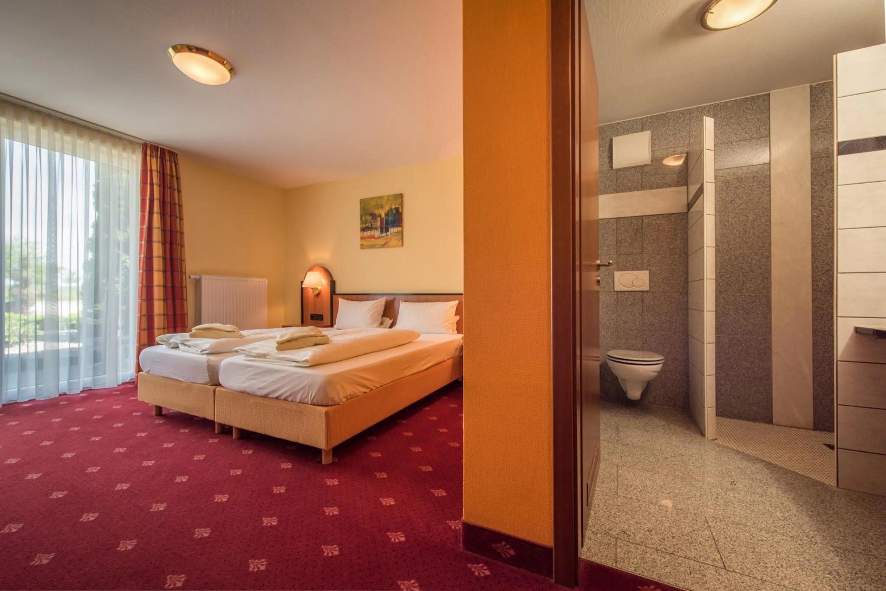Photo of the whole room, Bed in Landhotel und Gasthof Hirsch Hüttenreute