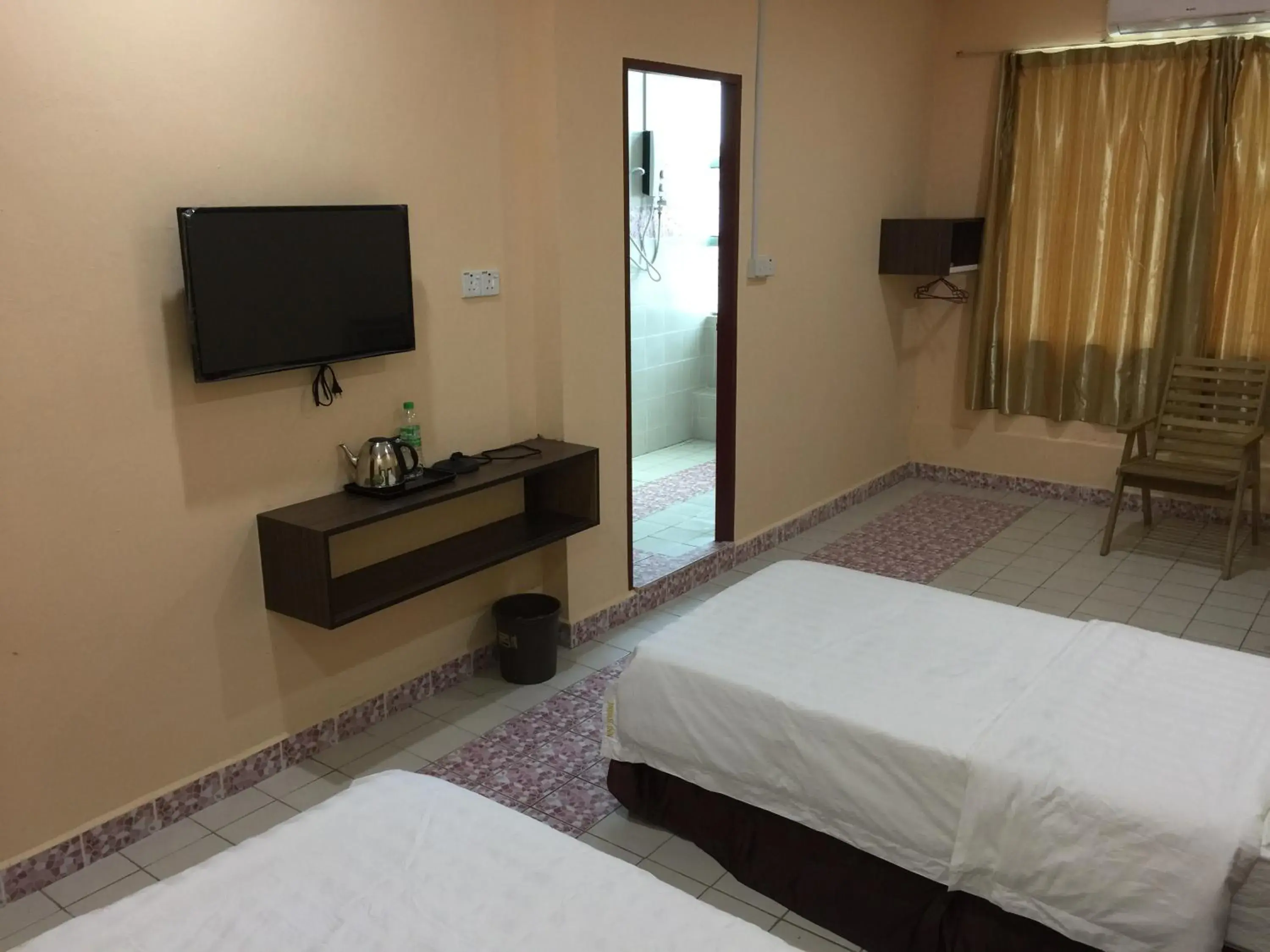 Bed in Indah Inn Bed in Indah Inn