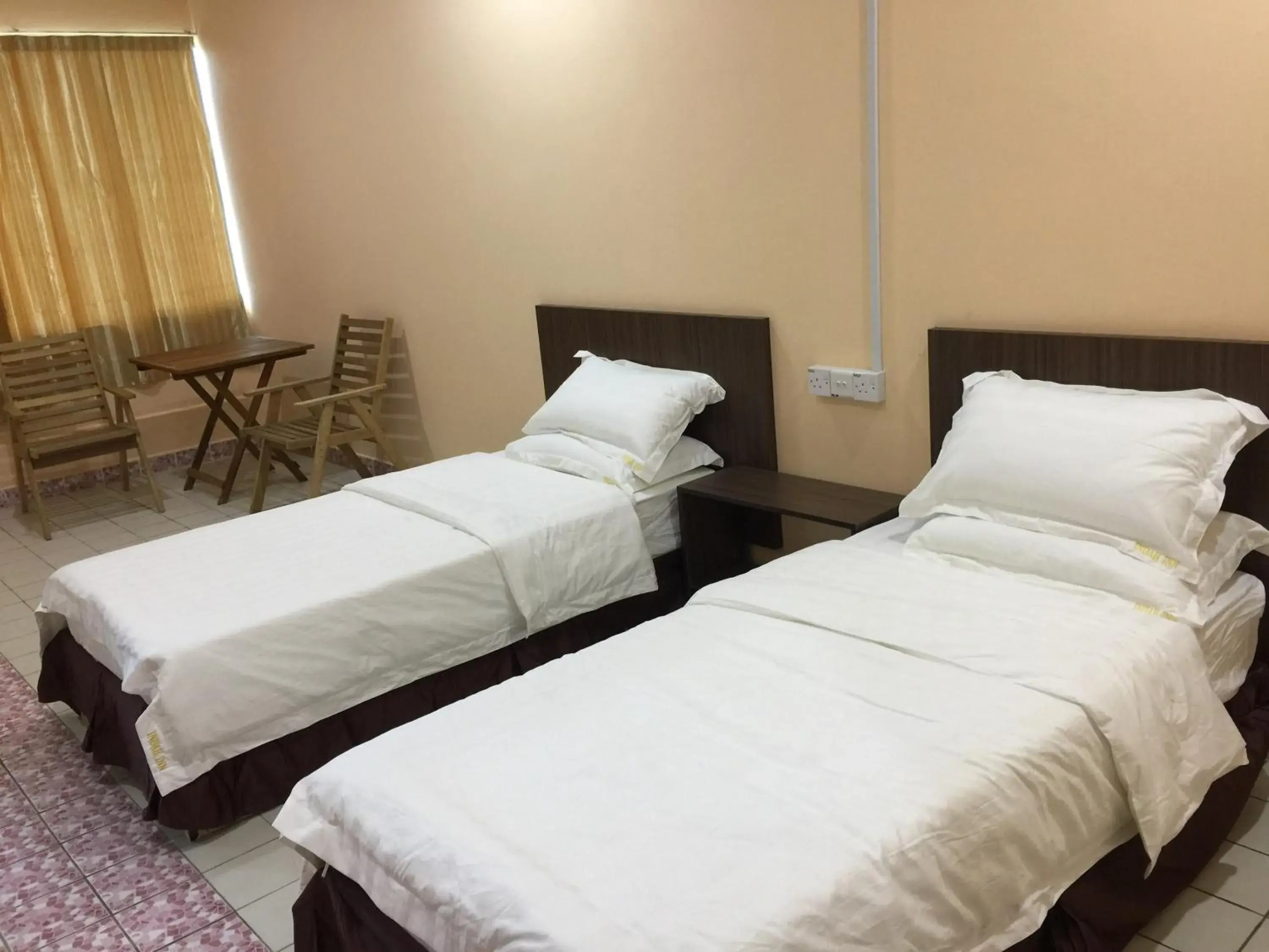 Bed in Indah Inn Bed in Indah Inn