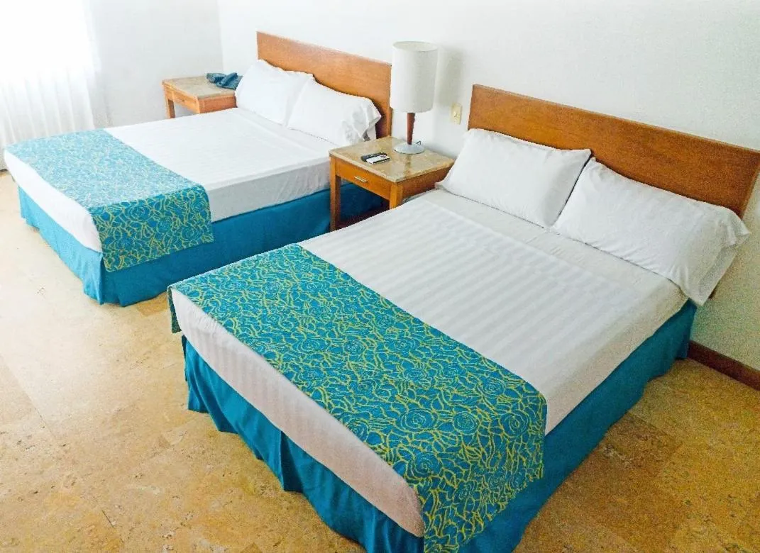Photo of the whole room, Bed in Hotel Oceania Cartagena