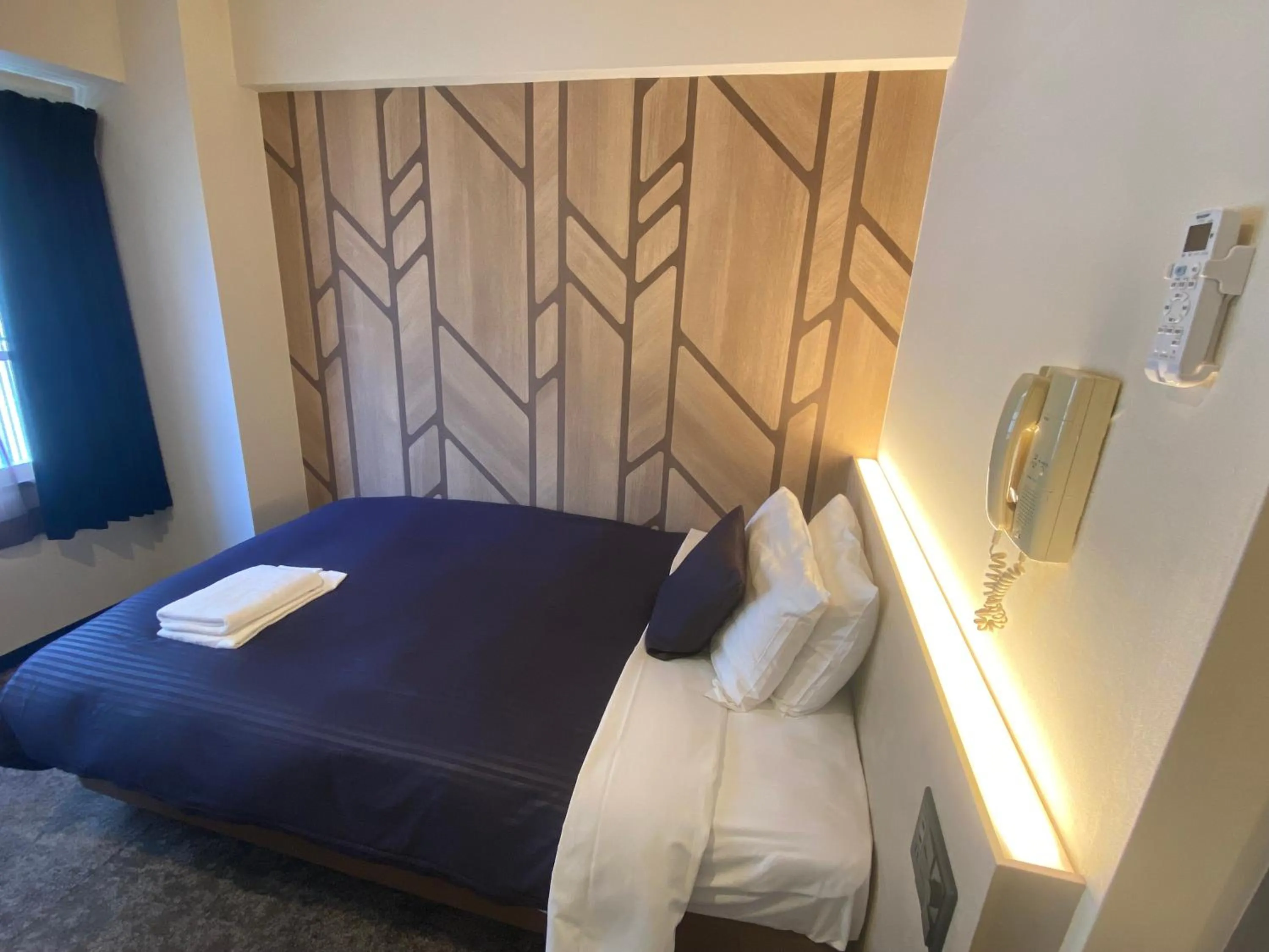 Bed in HOTEL LiVEMAX BUDGET Higashi Ueno