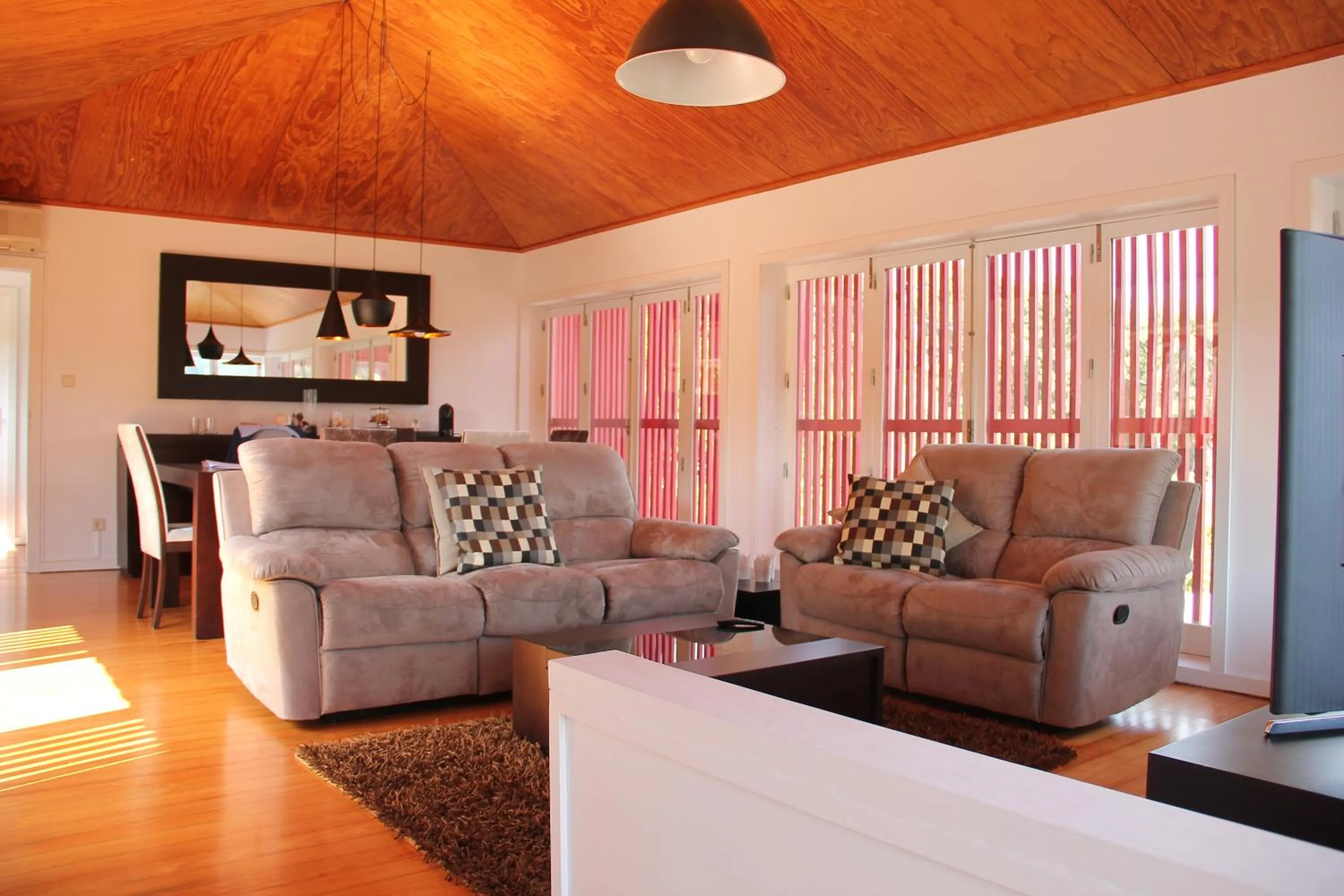 Communal lounge/ TV room in Casa da Bichaca