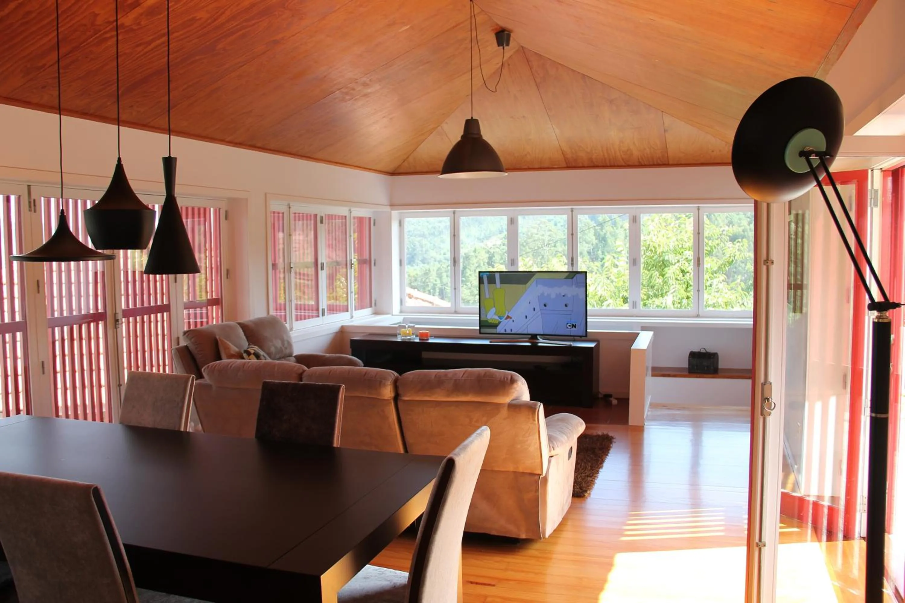 Communal lounge/ TV room in Casa da Bichaca