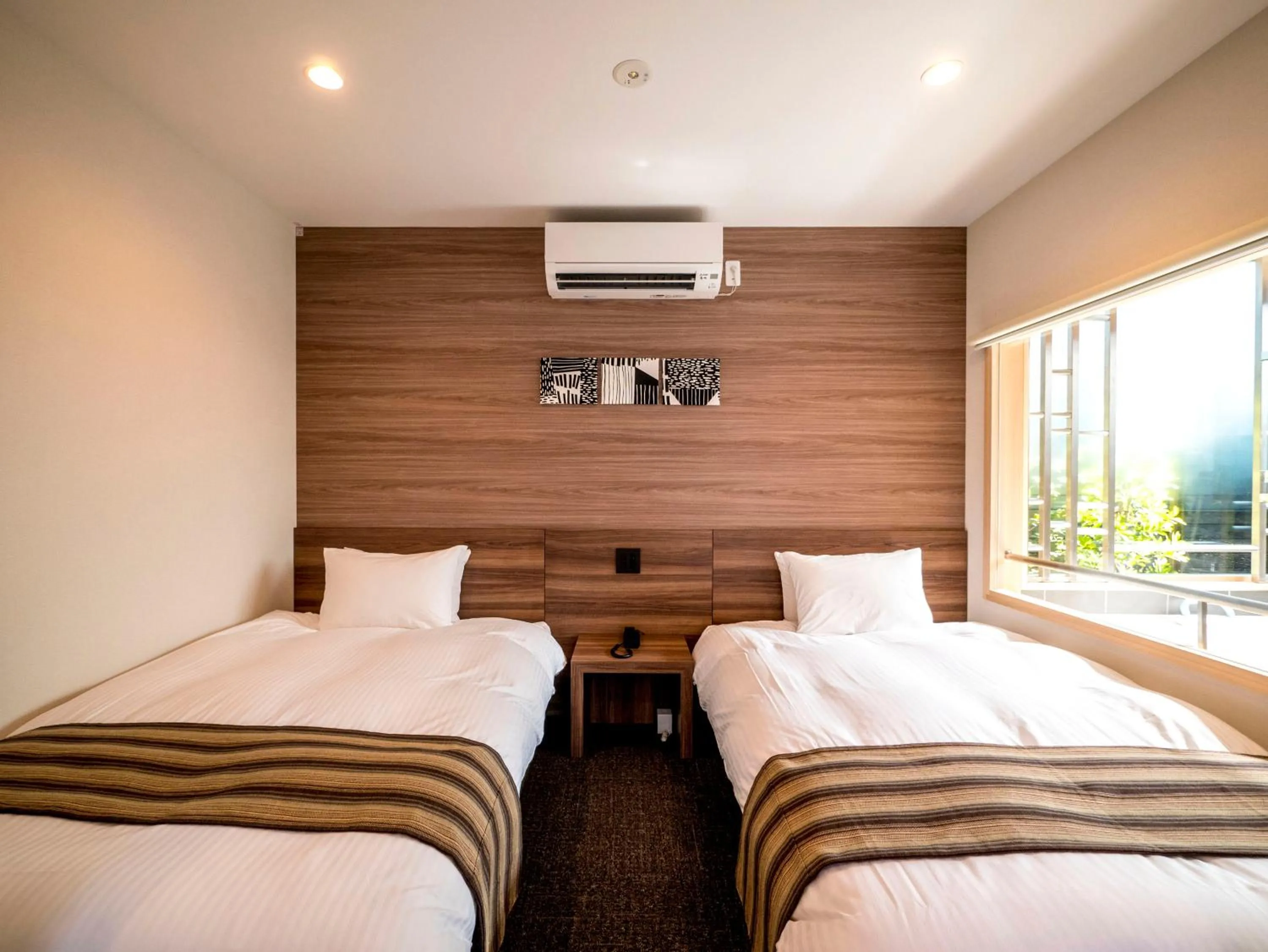 Bed in HOTEL R9 Kujukuri "ex Casual Resort COFF Ichinomiya"