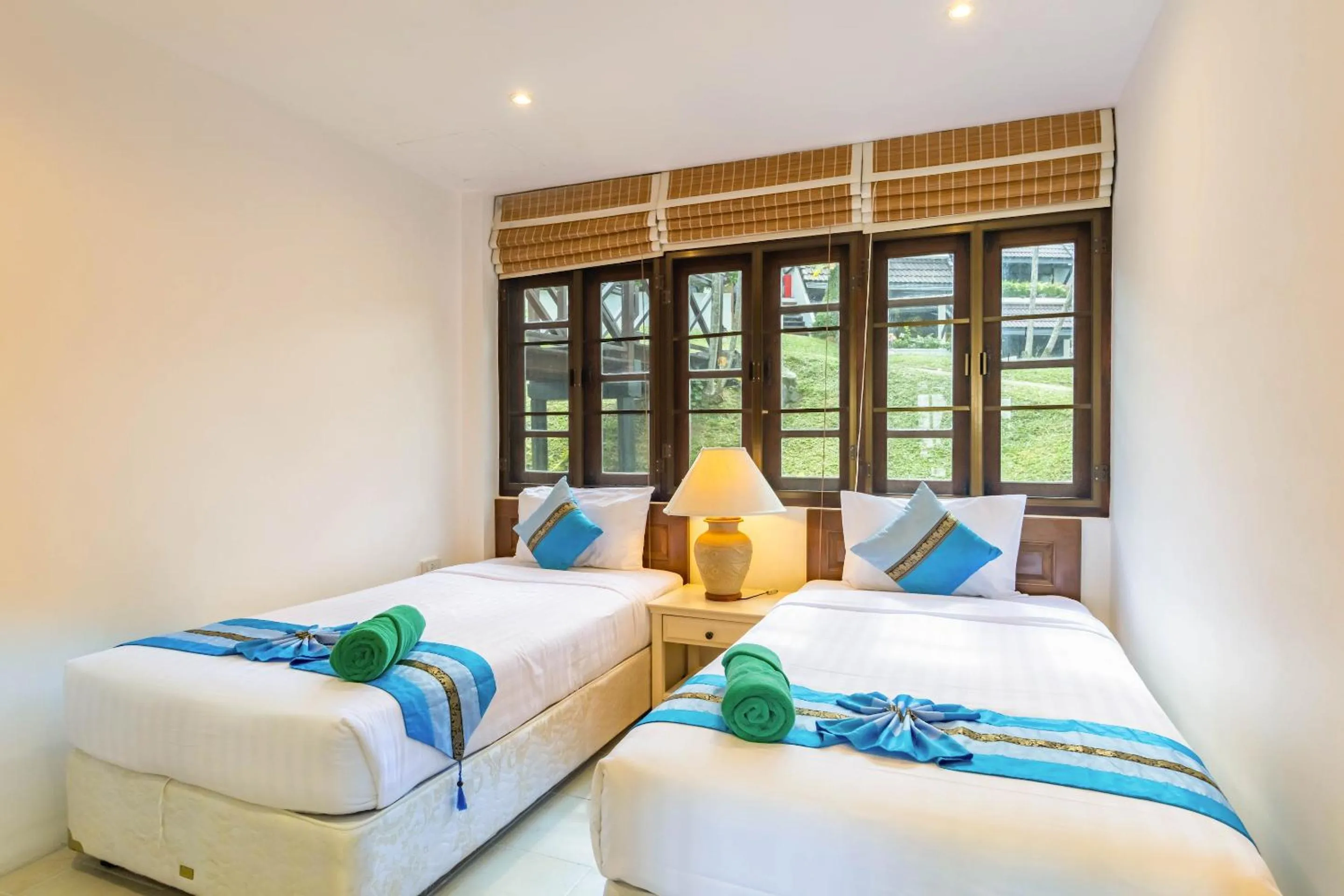 Bed in Kamala Beach Estate Resort - SHA Extra Plus