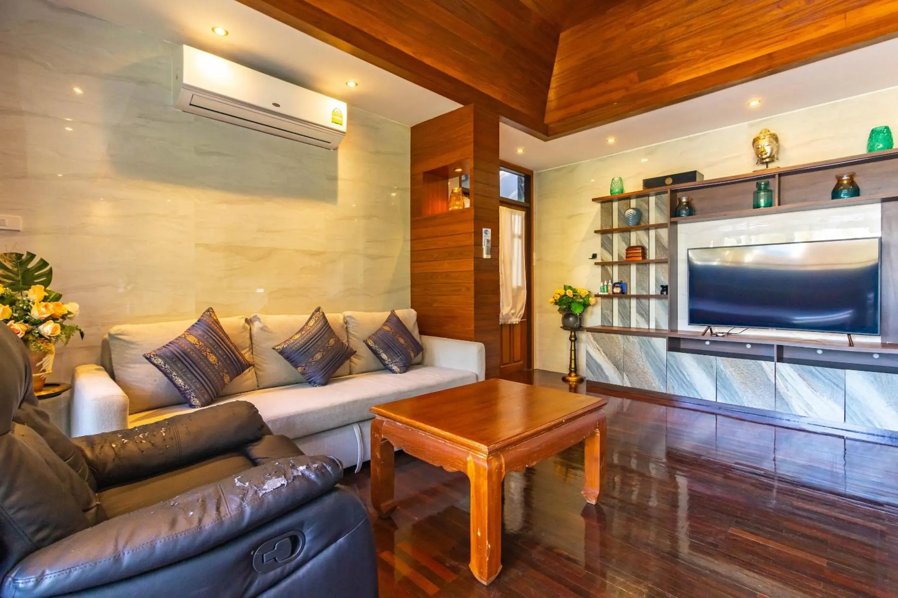Living room in Kamala Beach Estate Resort - SHA Extra Plus Living room in Kamala Beach Estate Resort - SHA Extra Plus