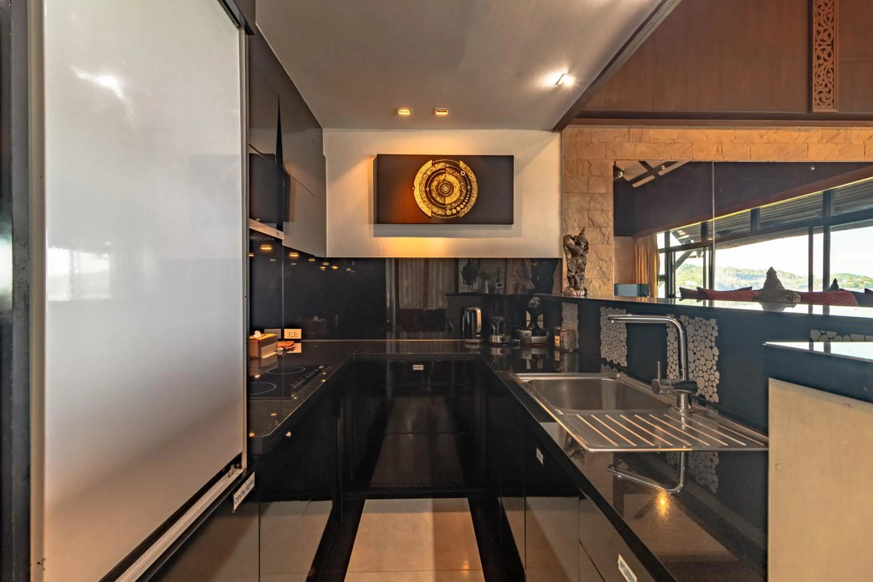 kitchen in Kamala Beach Estate Resort - SHA Extra Plus