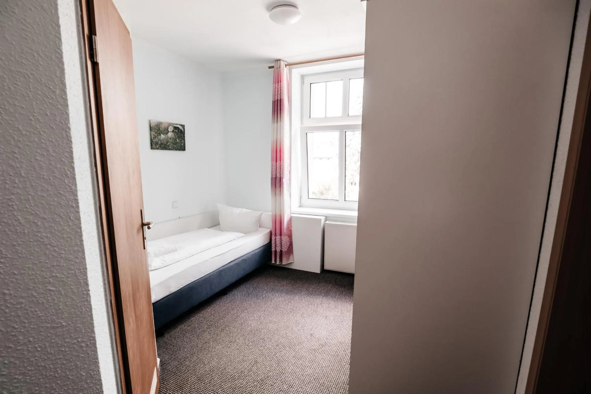 Photo of the whole room, Bed in Hotel am Fluss