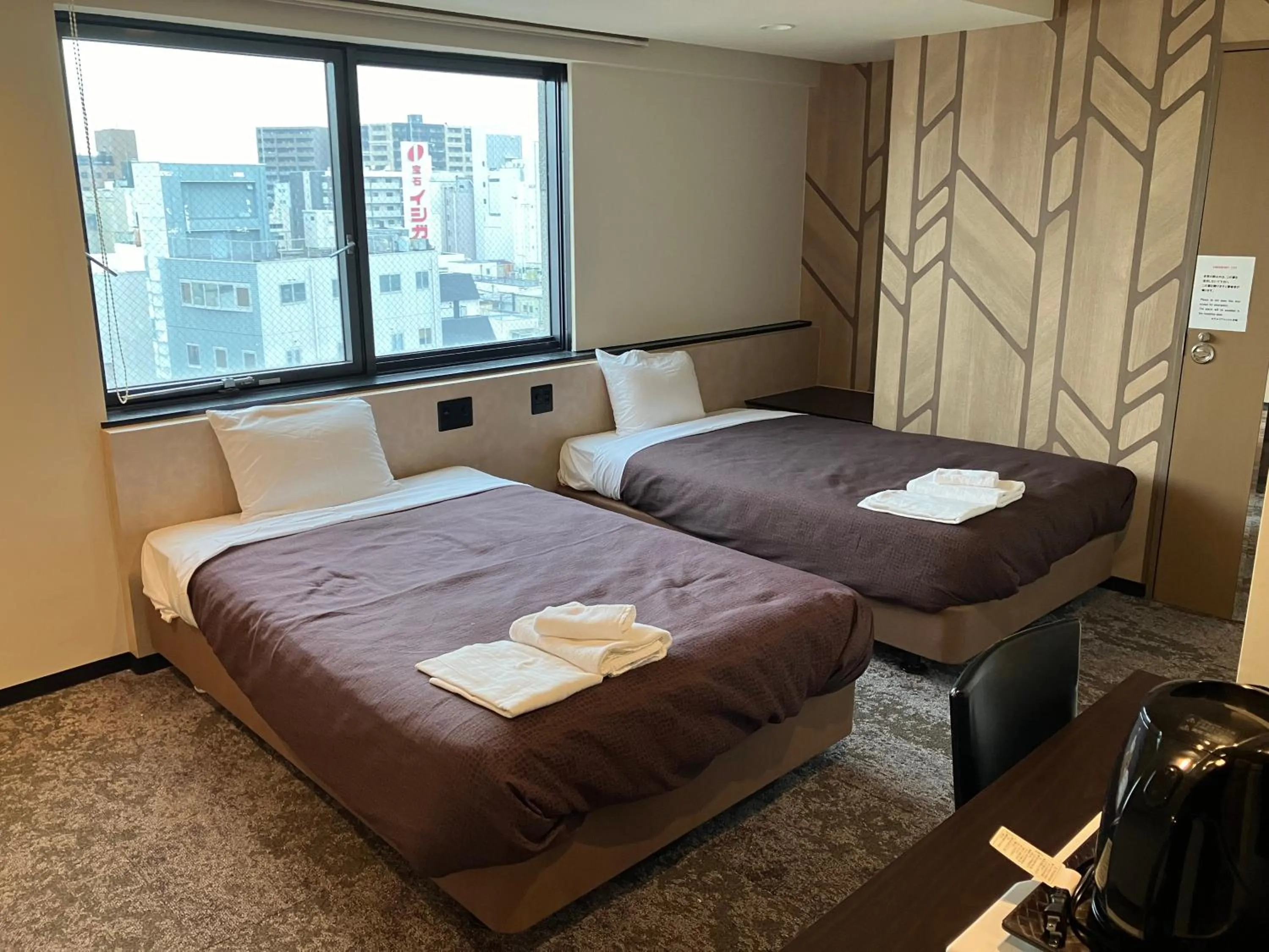 Bed in HOTEL LiVEMAX BUDGET Amagasaki