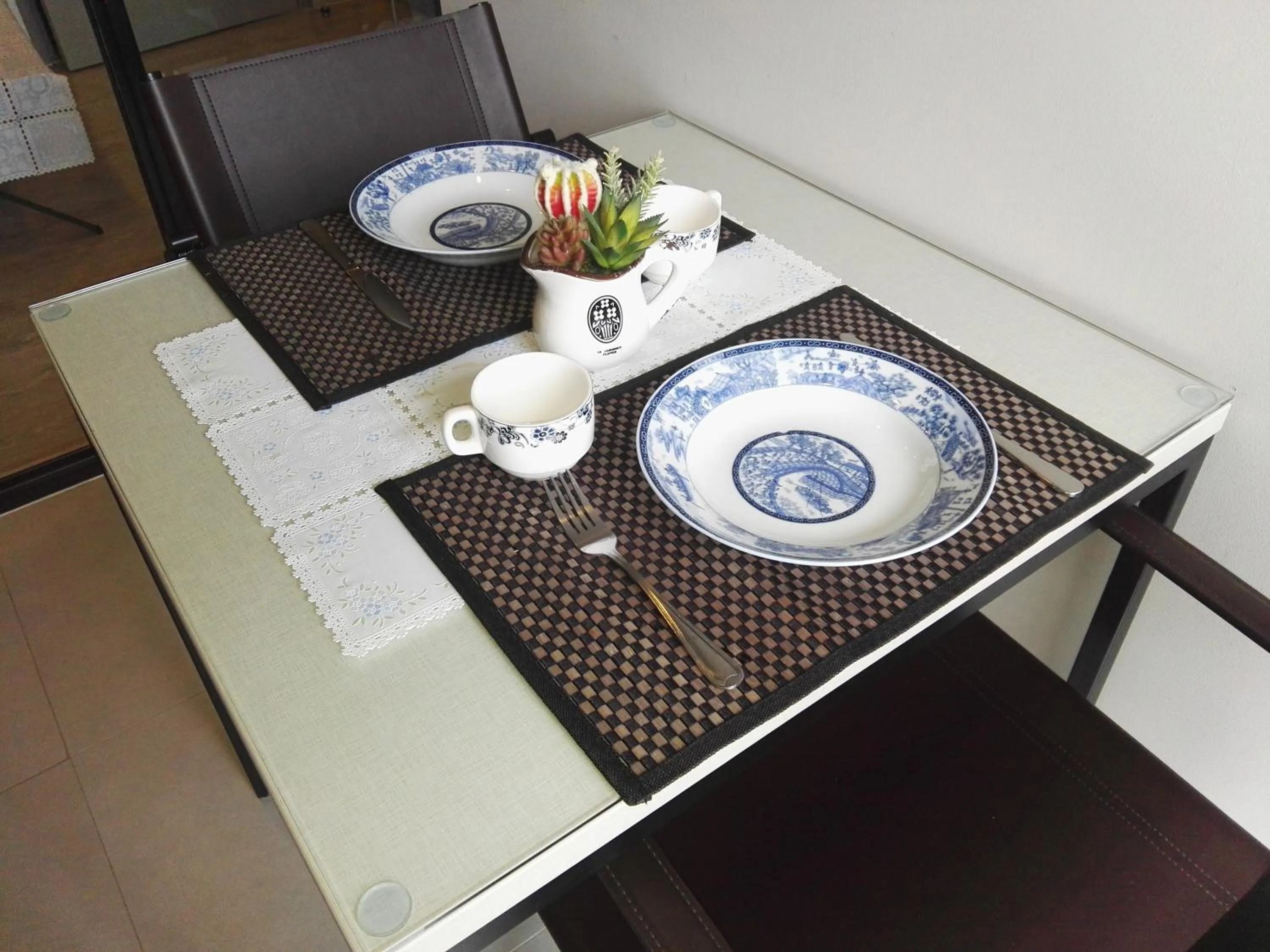 Dining area in LLX Apartments at The Base condo