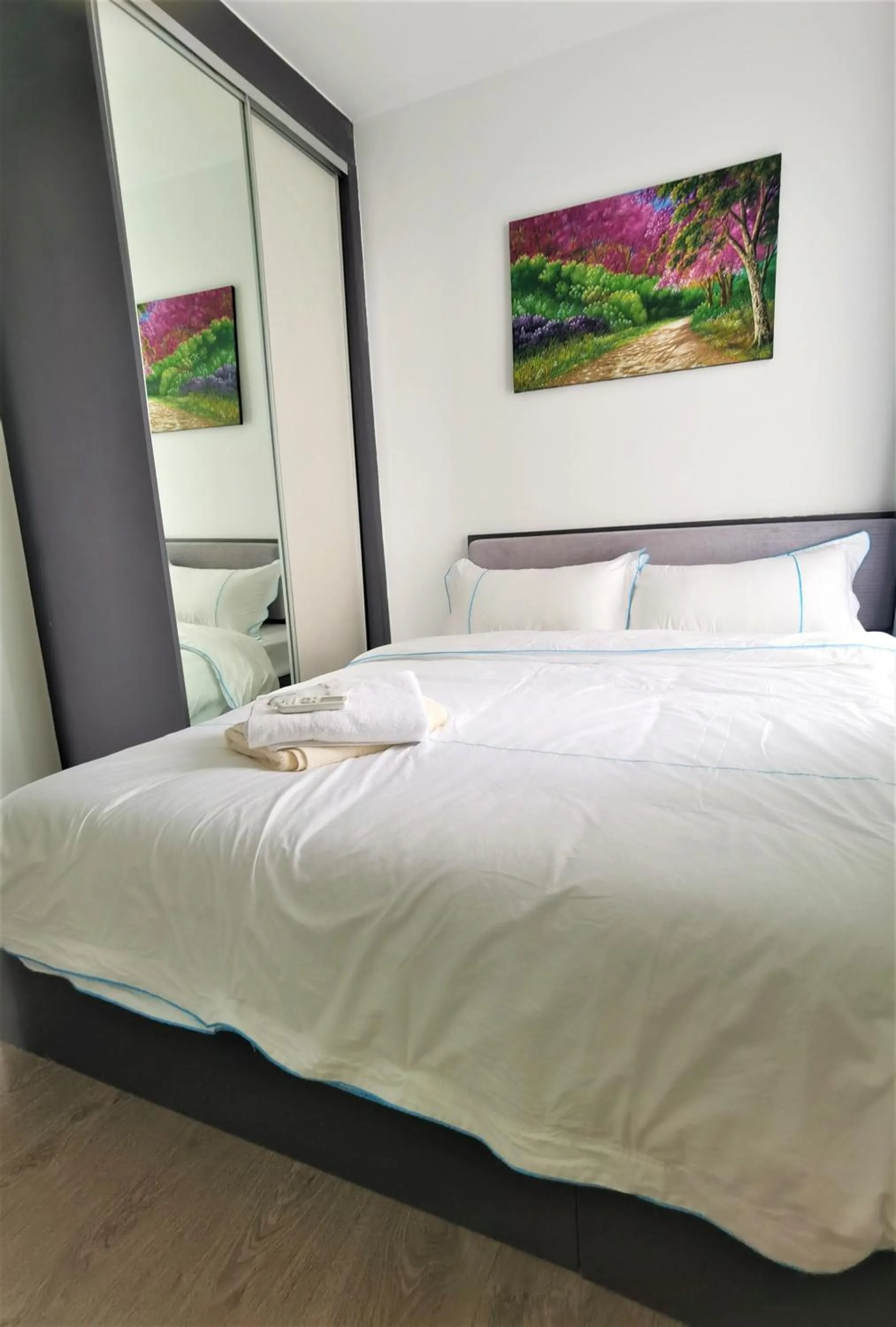 Bed in LLX Apartments at The Base condo