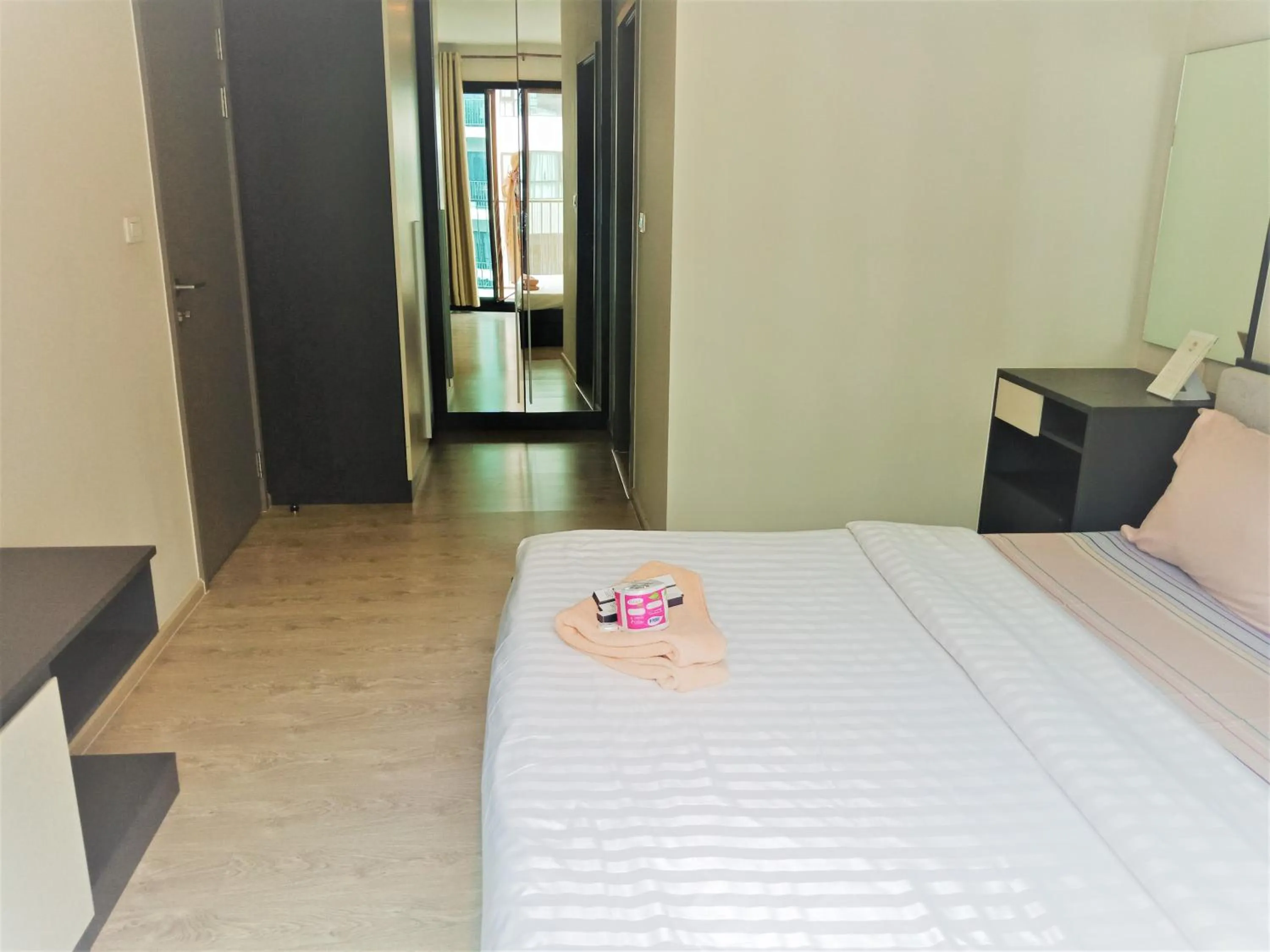 Bed in LLX Apartments at The Base condo