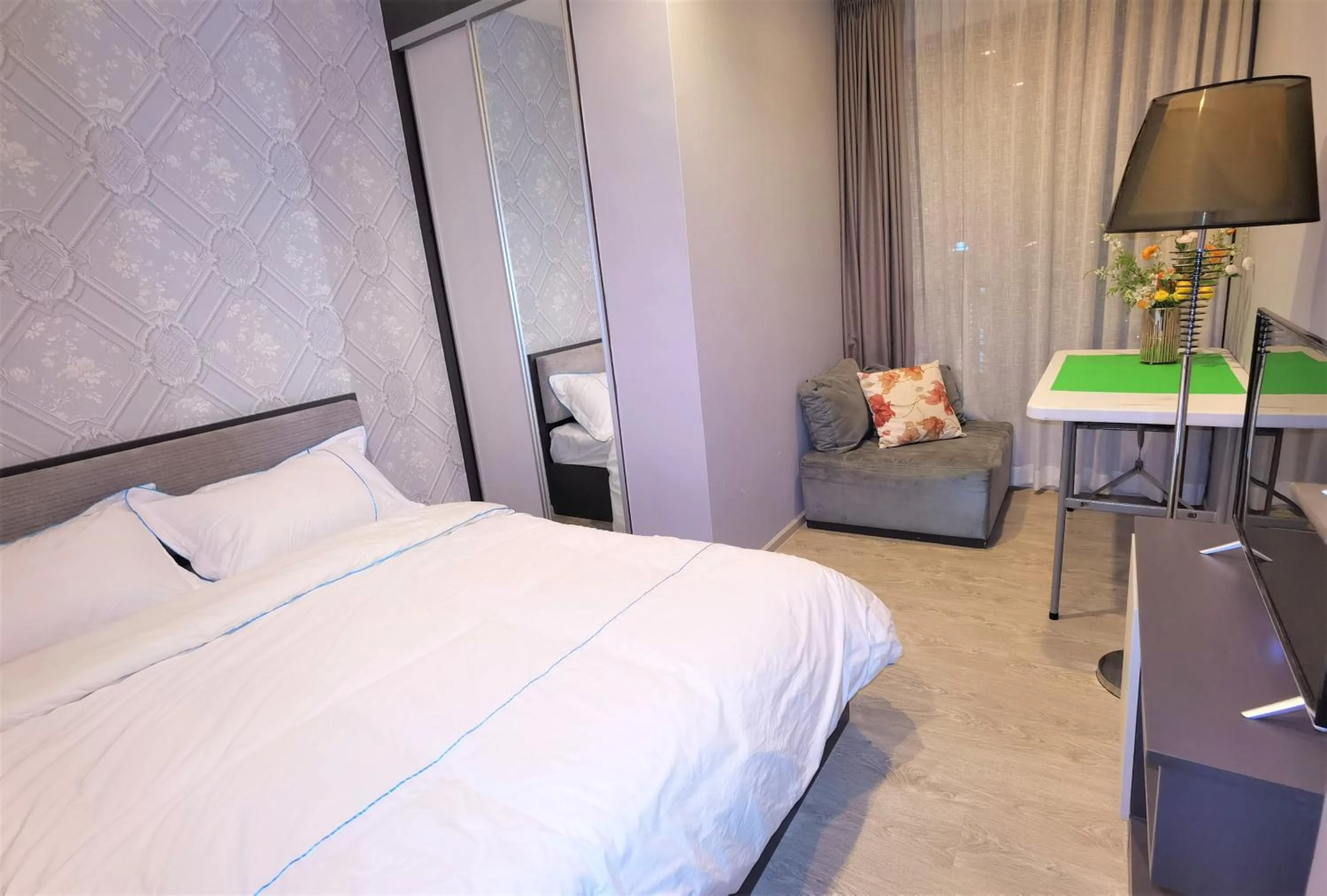 Bed in LLX Apartments at The Base condo