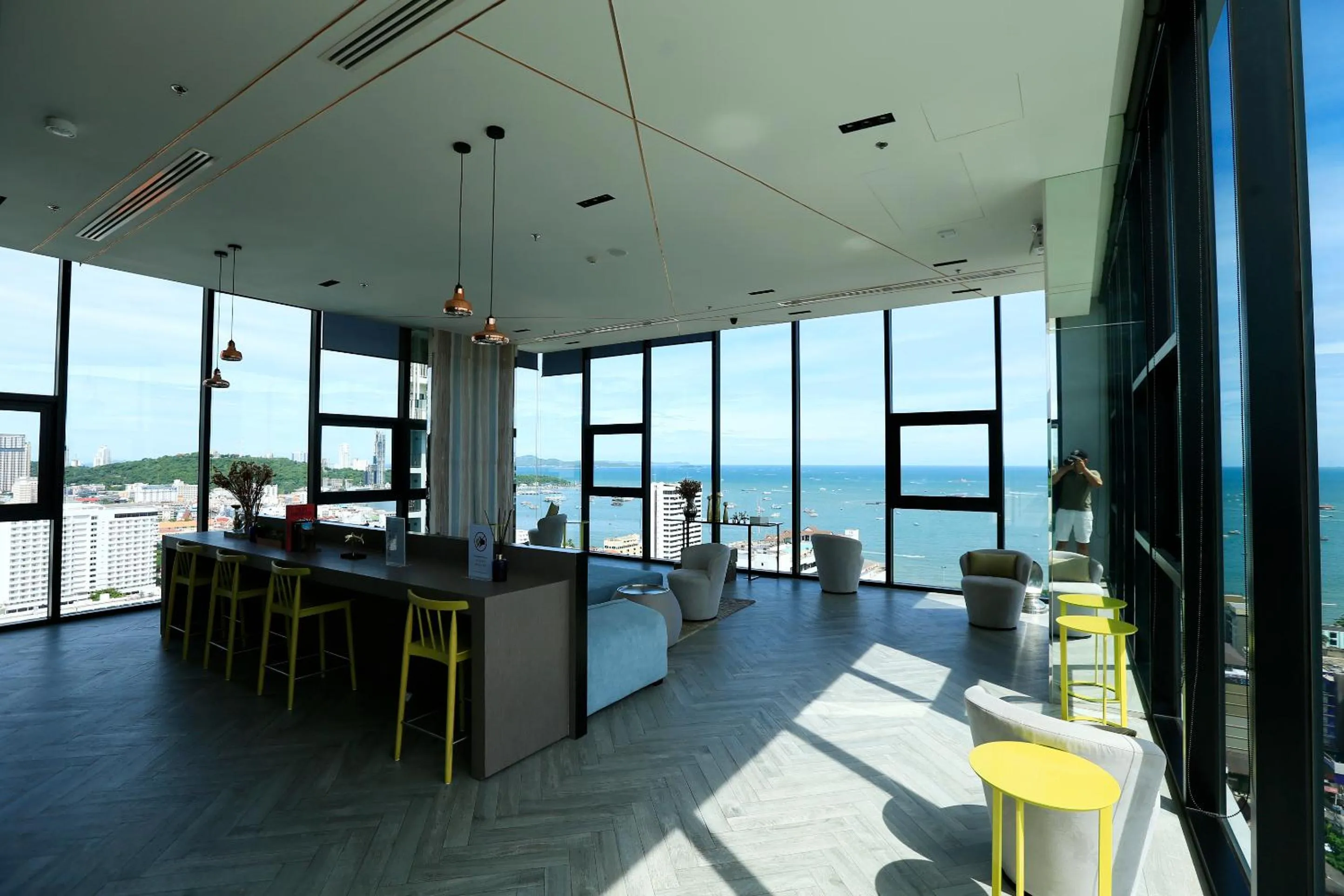 Communal lounge/ TV room in LLX Apartments at The Base condo