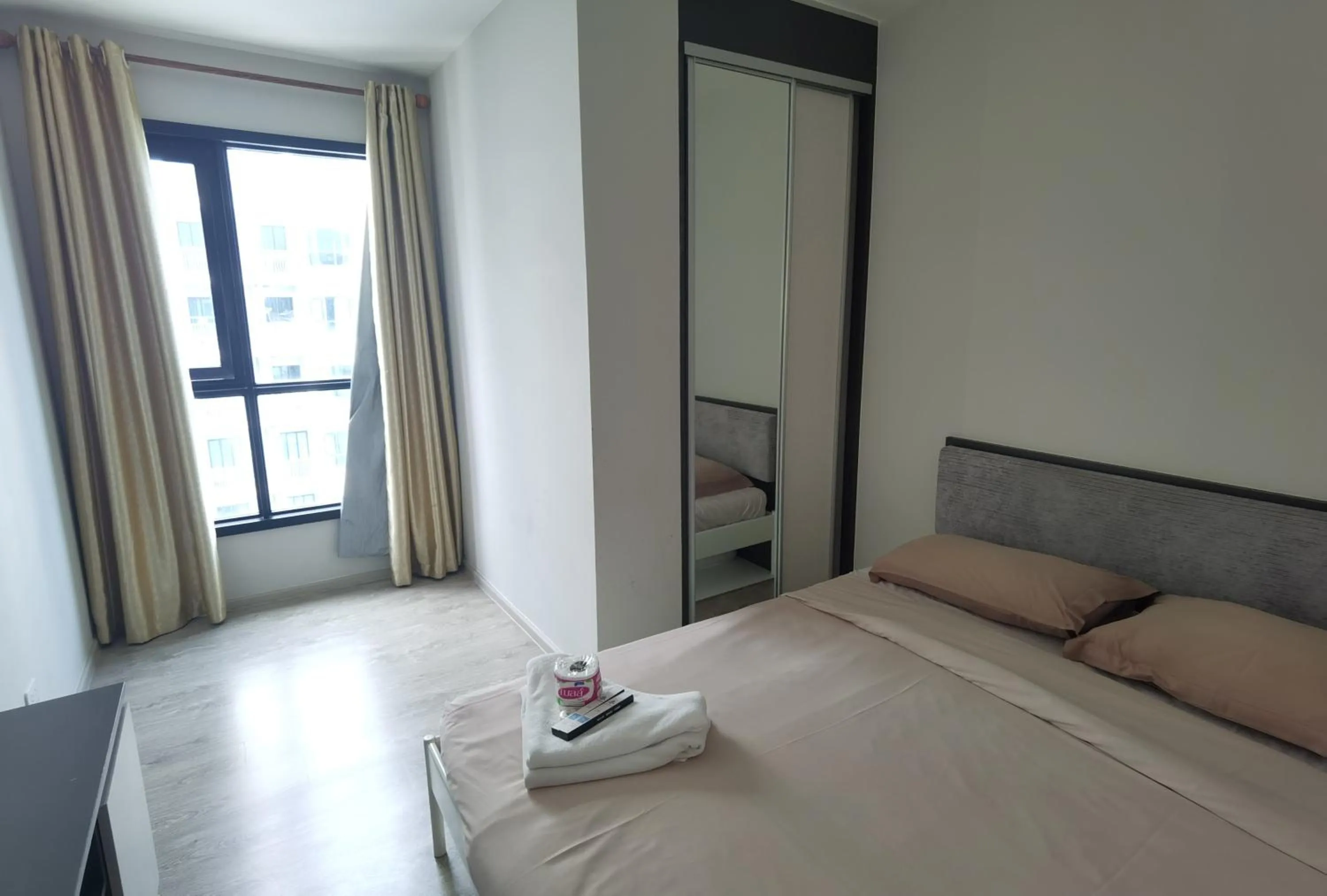 Bed in LLX Apartments at The Base condo