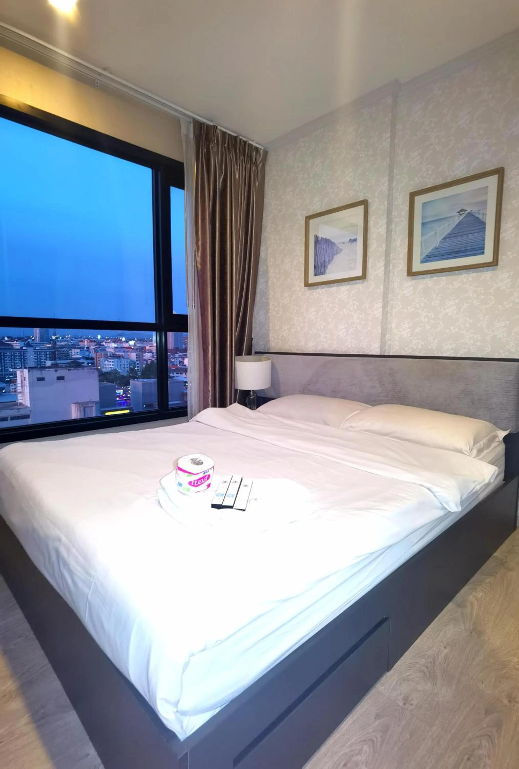 Bed in LLX Apartments at The Base condo