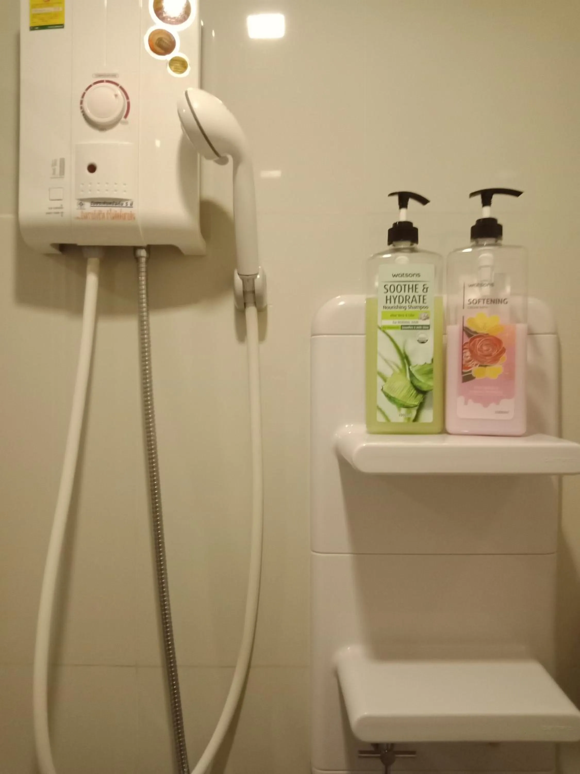Shower in LLX Apartments at The Base condo