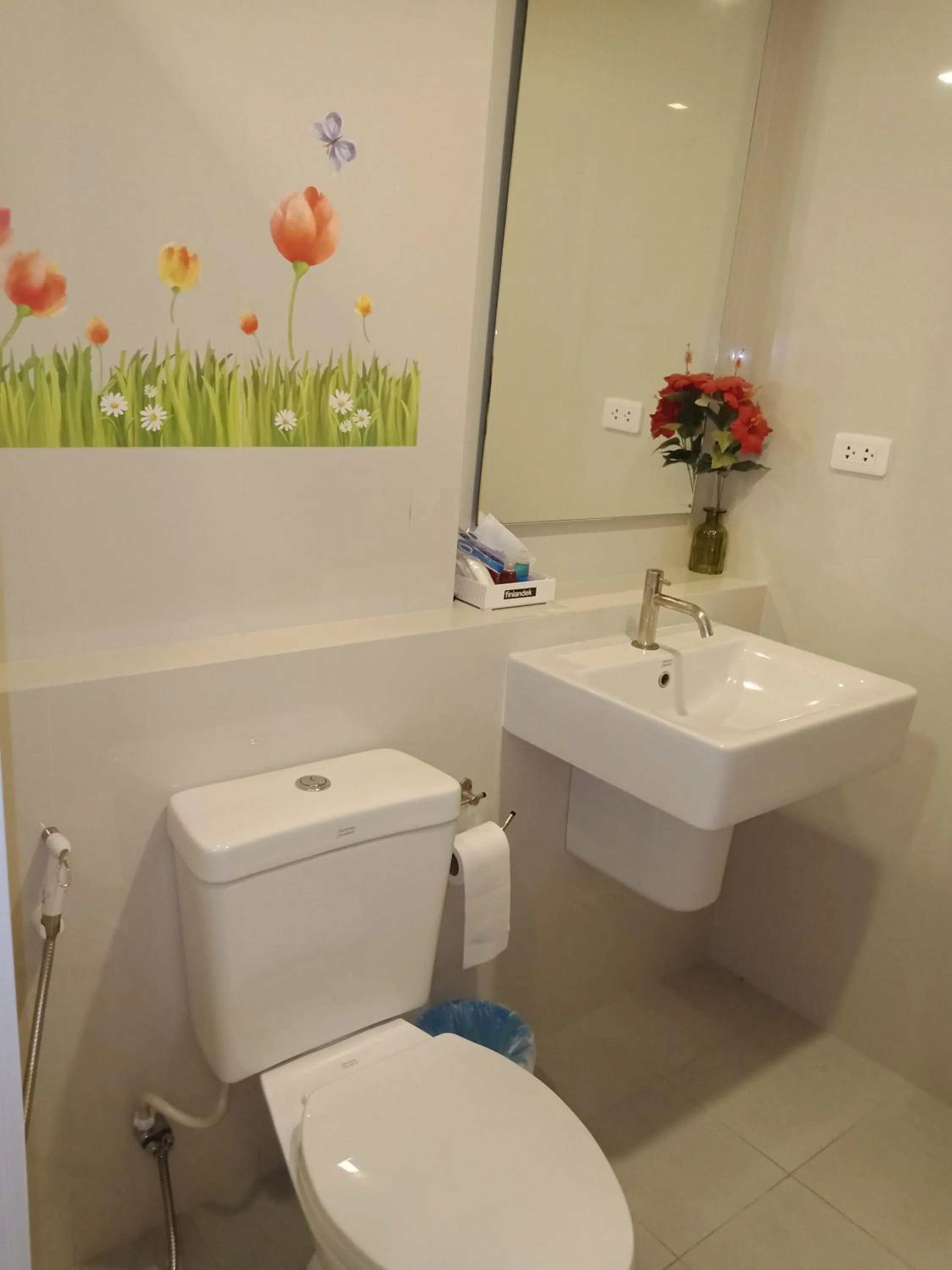 Toilet in LLX Apartments at The Base condo