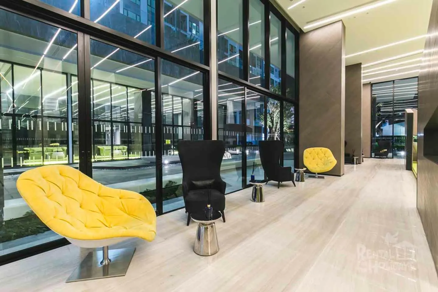 Communal lounge/ TV room in LLX Apartments at The Base condo