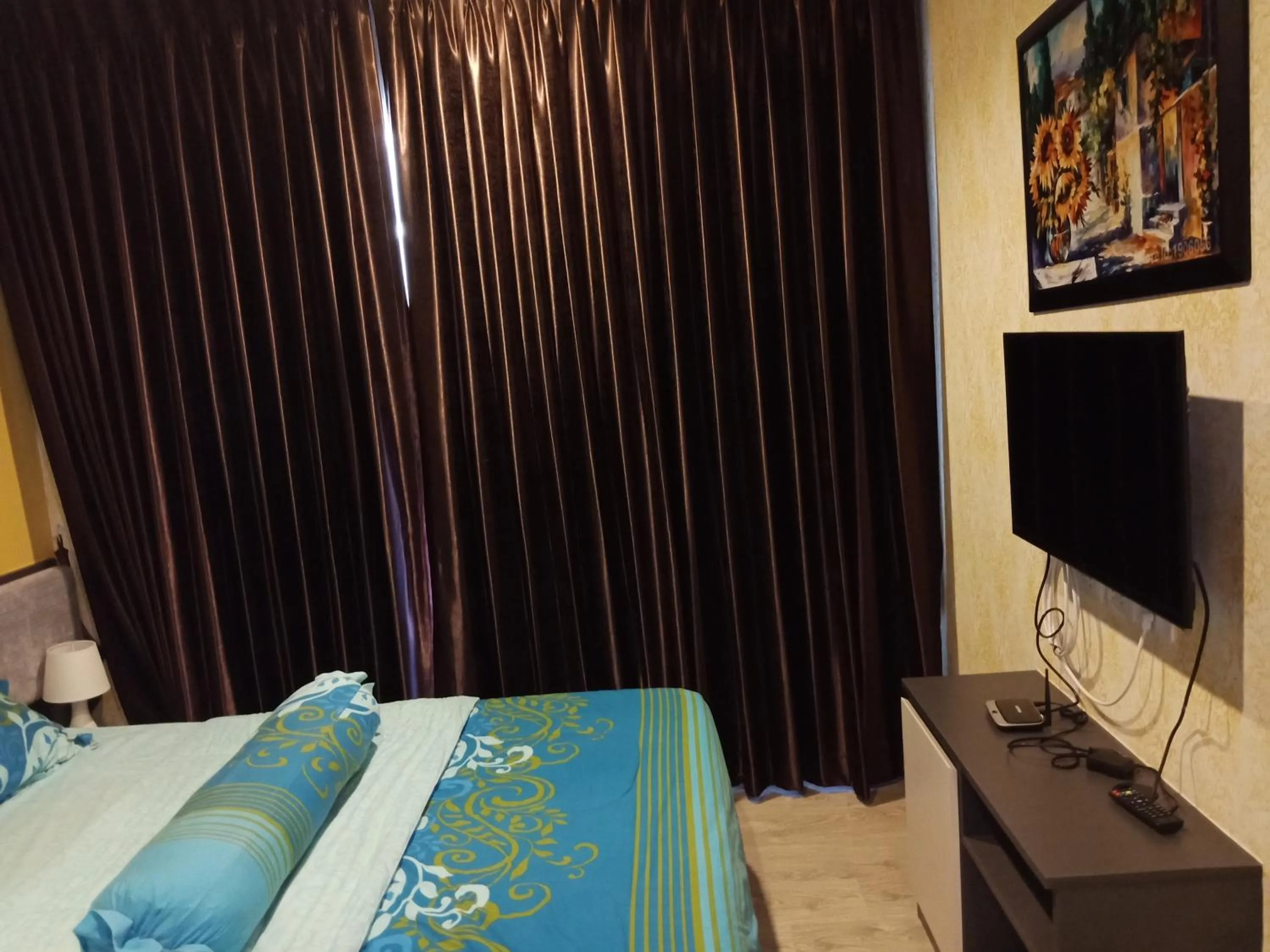 TV and multimedia, Bed in LLX Apartments at The Base condo