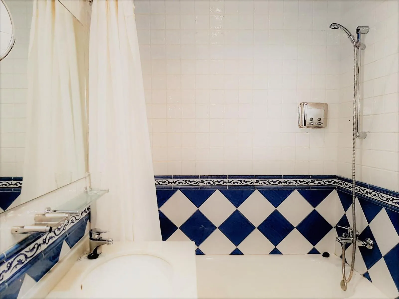 Bathroom in Hosteria Sara by gaiarooms