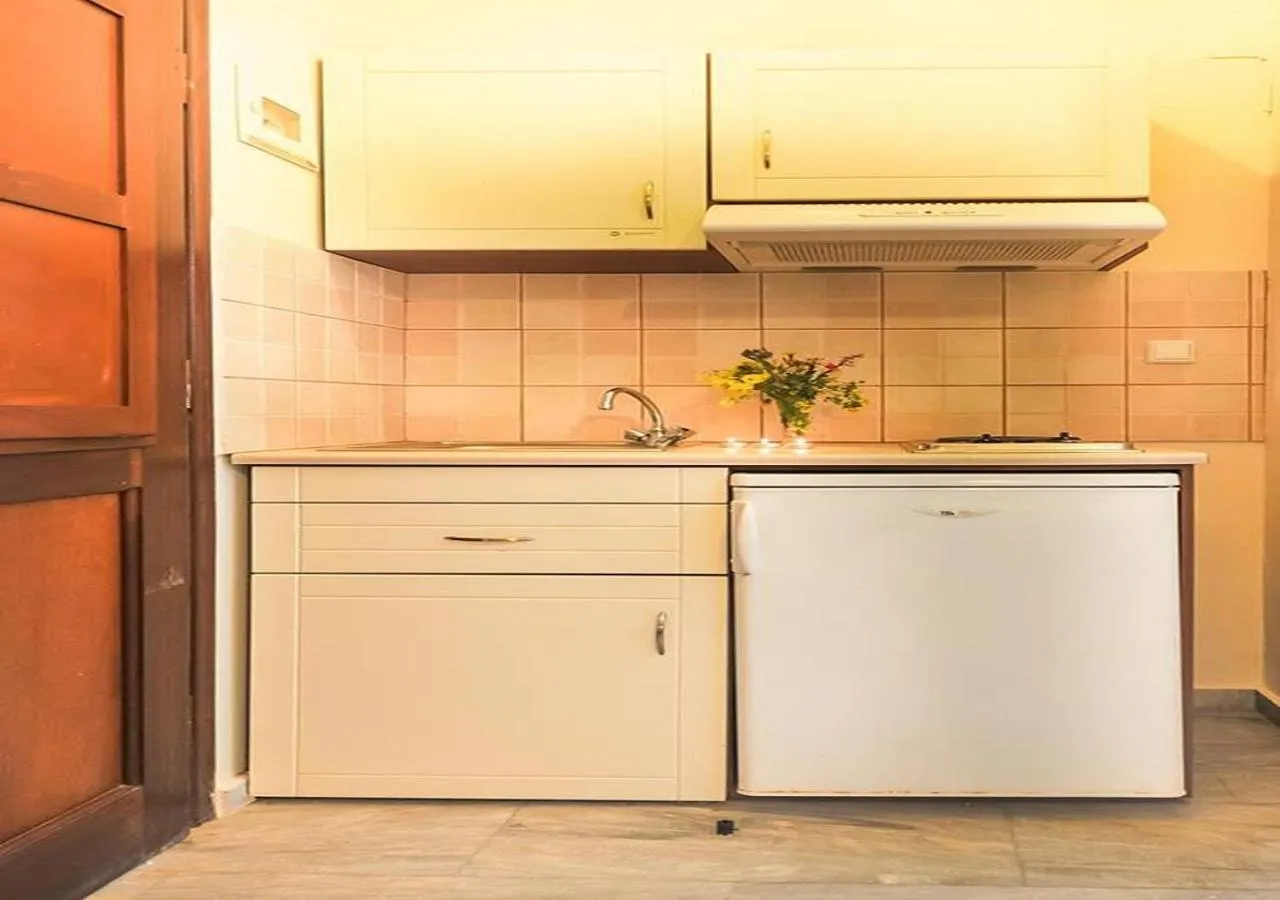 Kitchen or kitchenette in Kalypso Studios