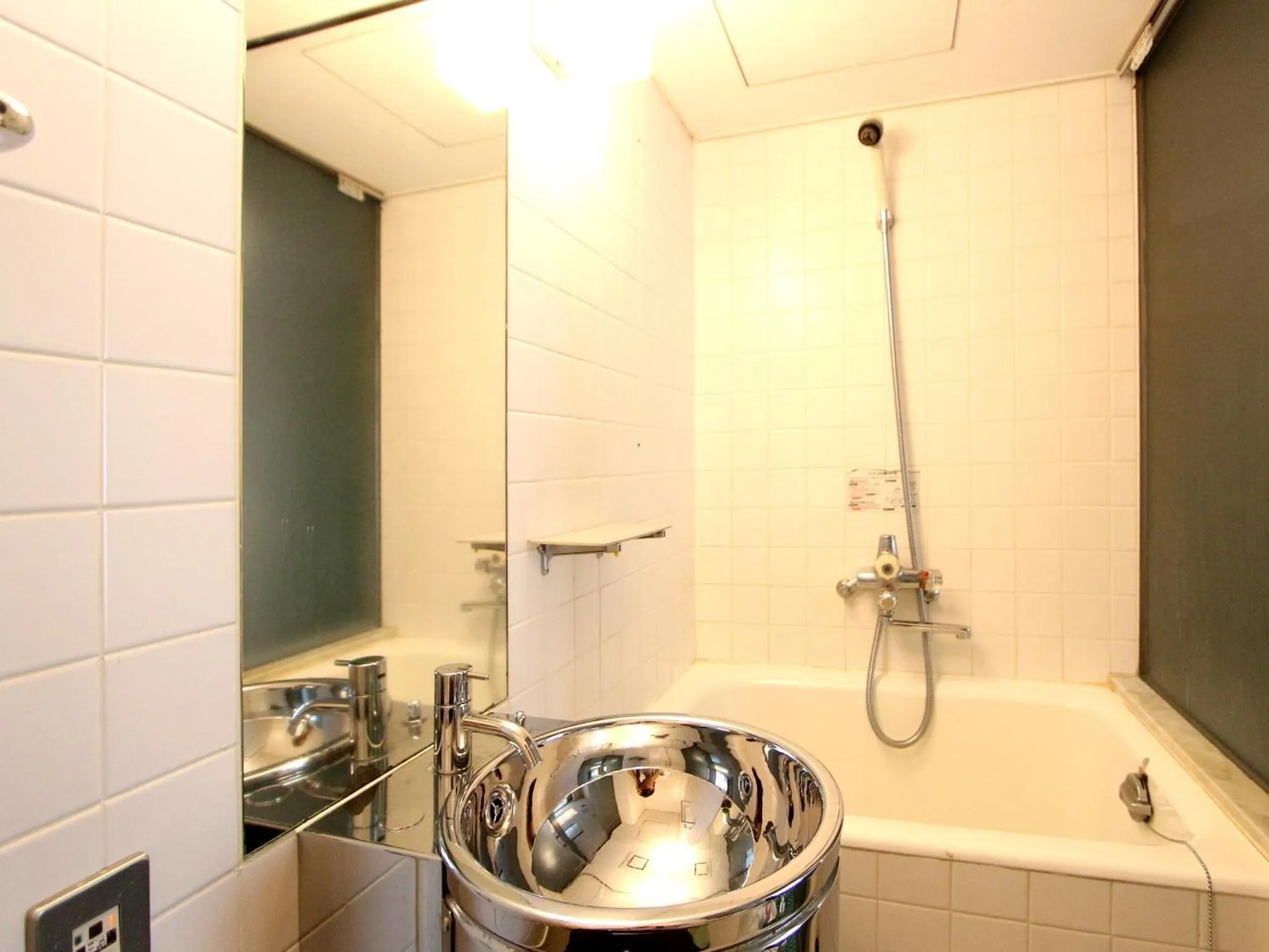 Bathroom in HOTEL LiVEMAX BUDGET Yumoto