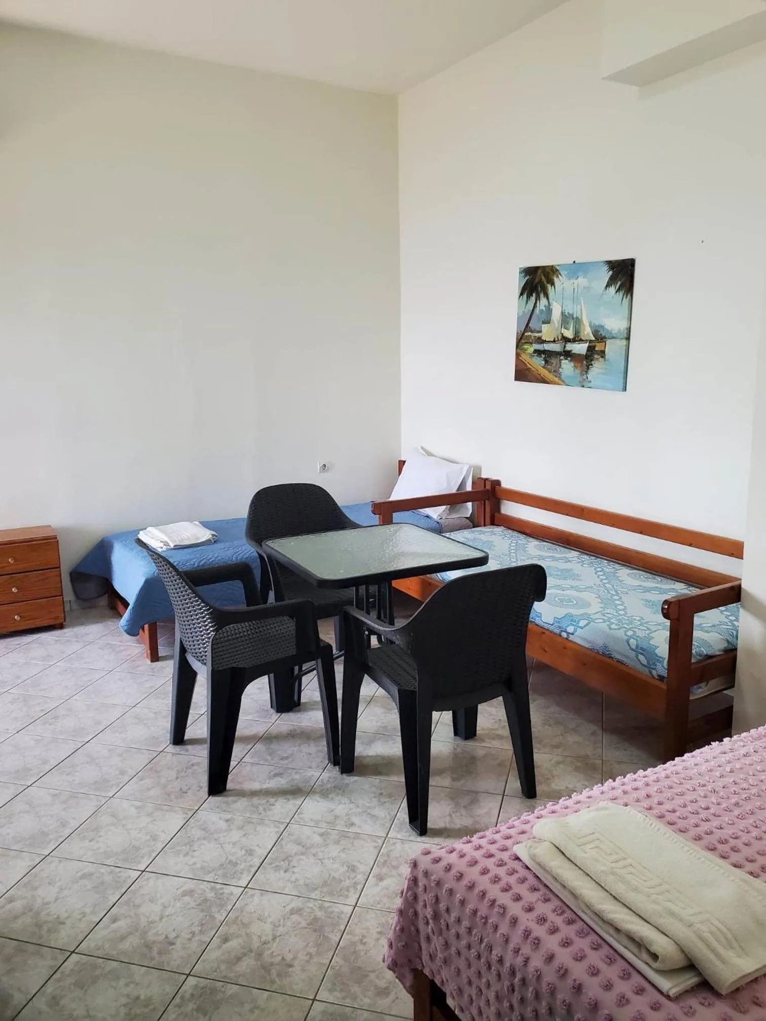 Seating area, Bed in Villa Koutsakis