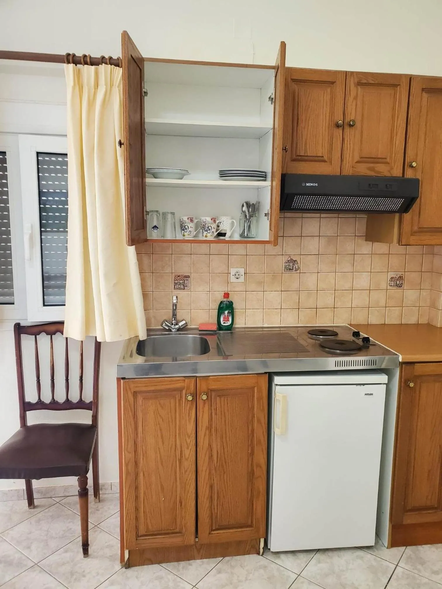 Kitchen or kitchenette in Villa Koutsakis