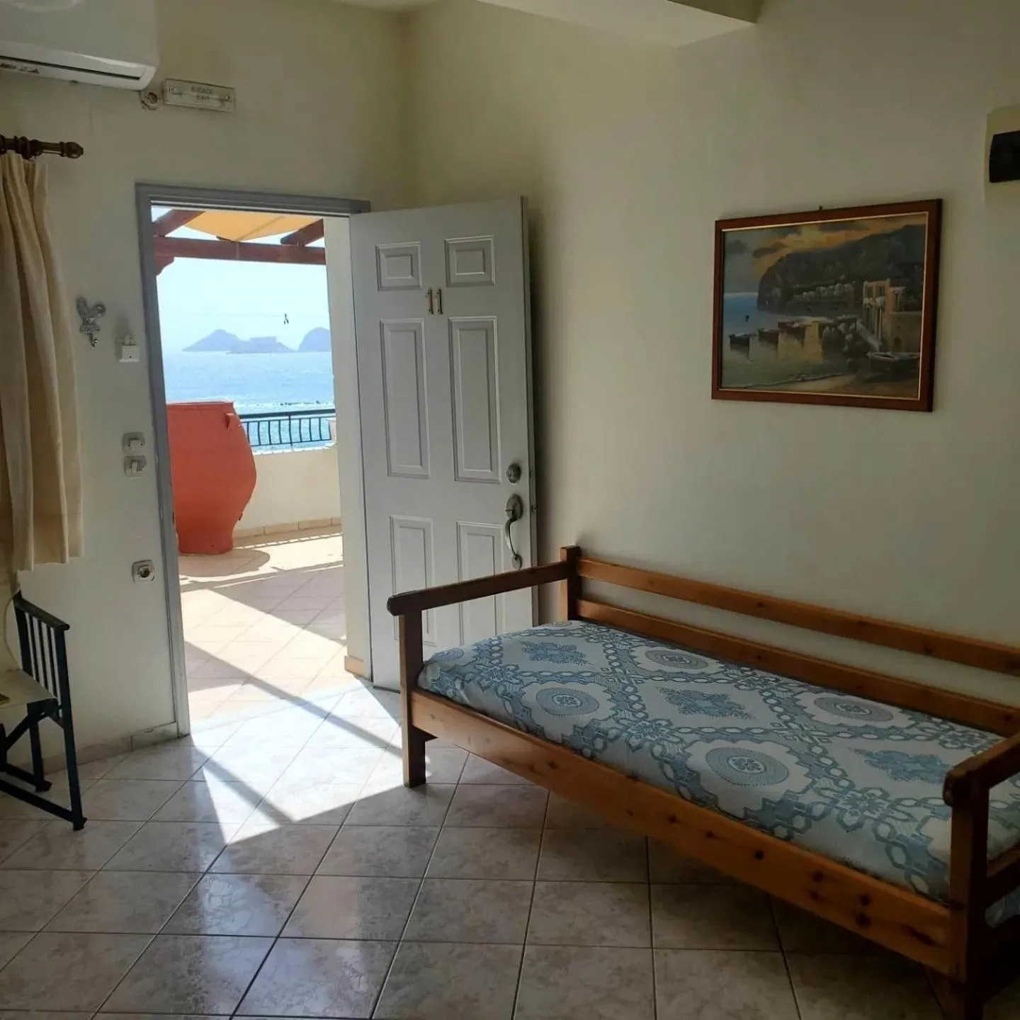 Seating area, Bed in Villa Koutsakis