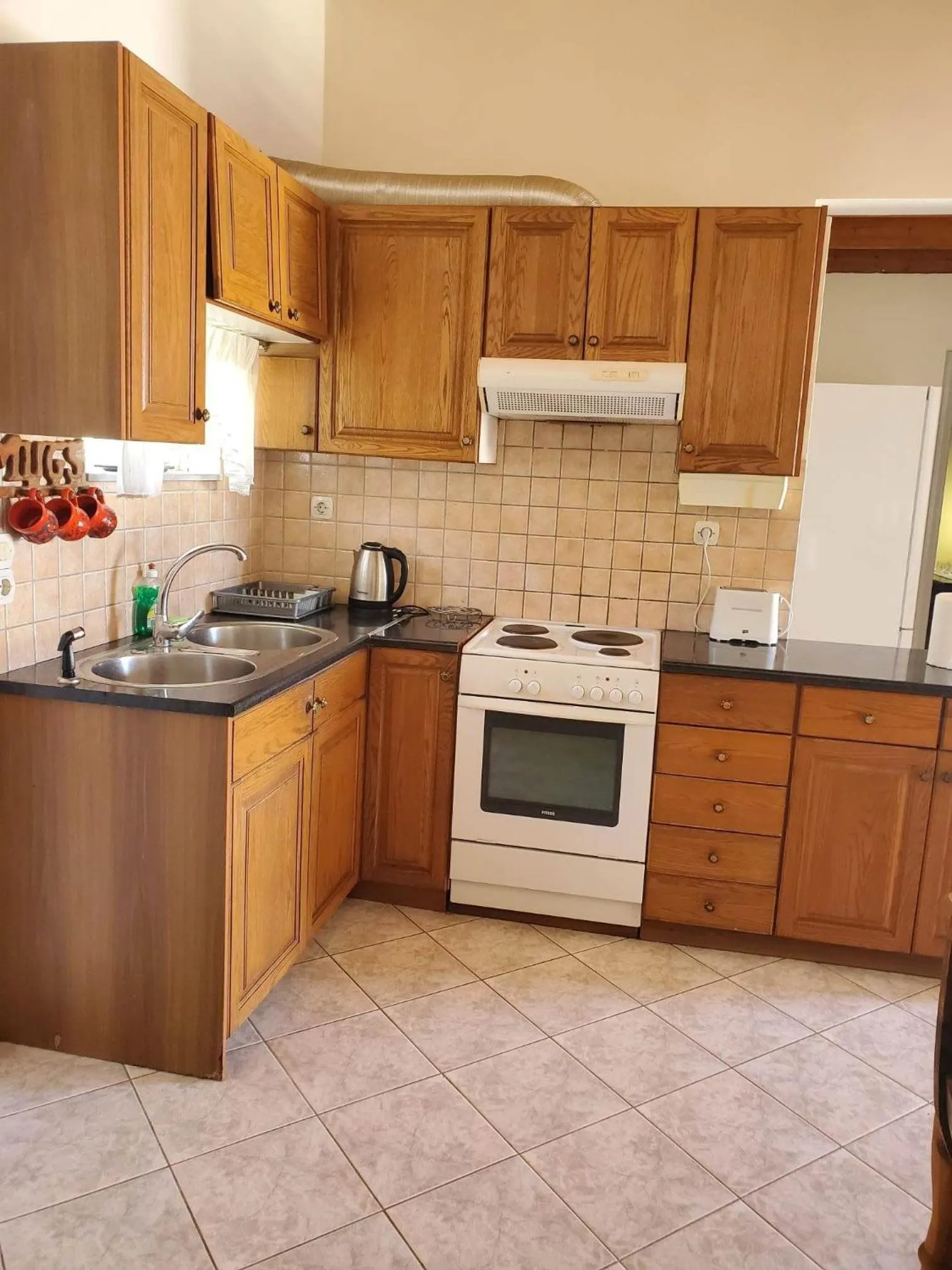 Kitchen or kitchenette in Villa Koutsakis