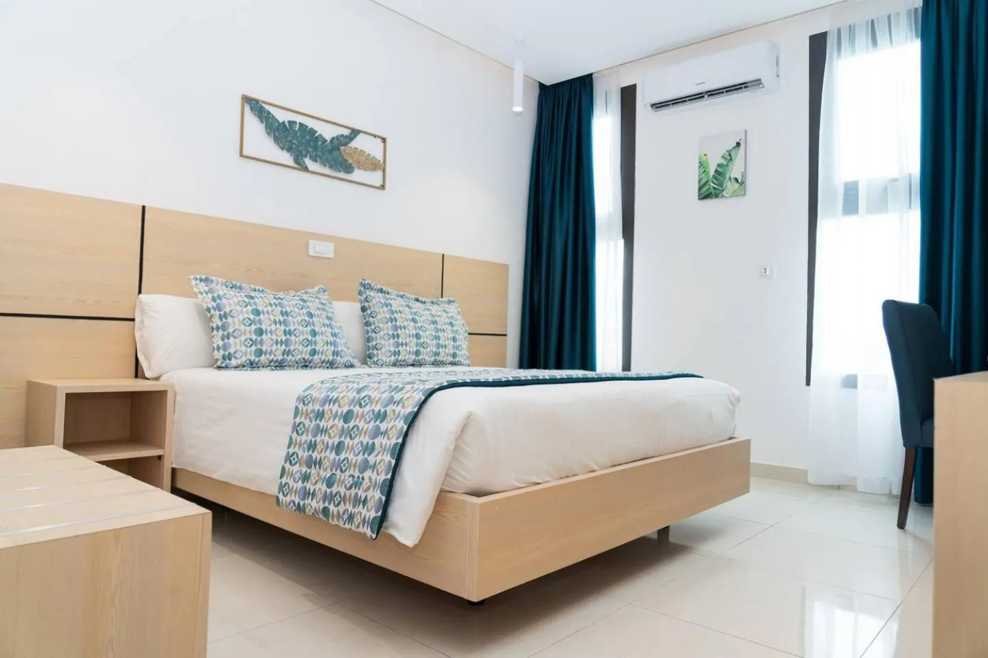 Bed in Palm Club Hotel