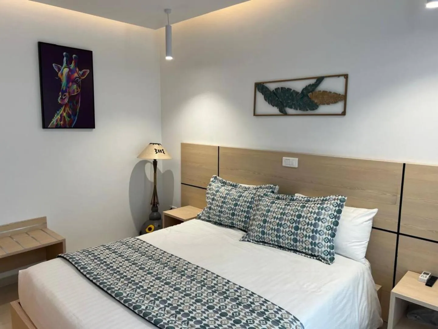 Bed in Palm Club Hotel