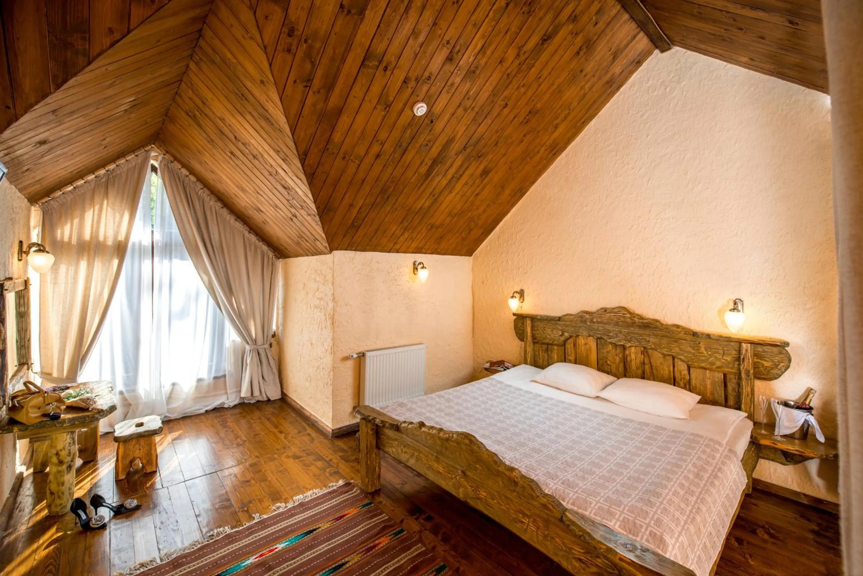 Living room, Bed in Drevny Grad Park-hotel