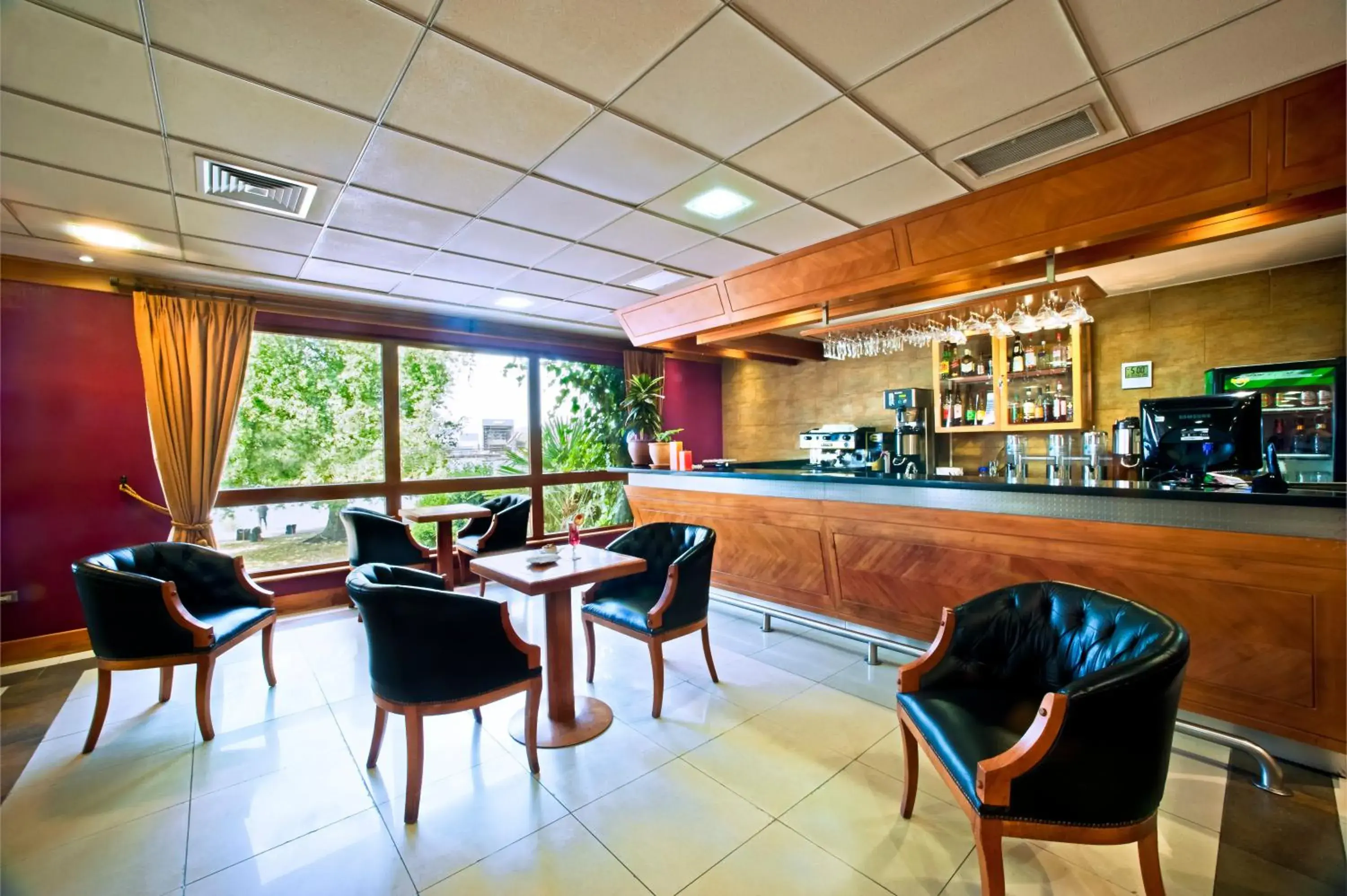 Lounge or bar in Hotel Diego de Almagro Valdivia Lounge or bar in Hotel Diego de Almagro Valdivia