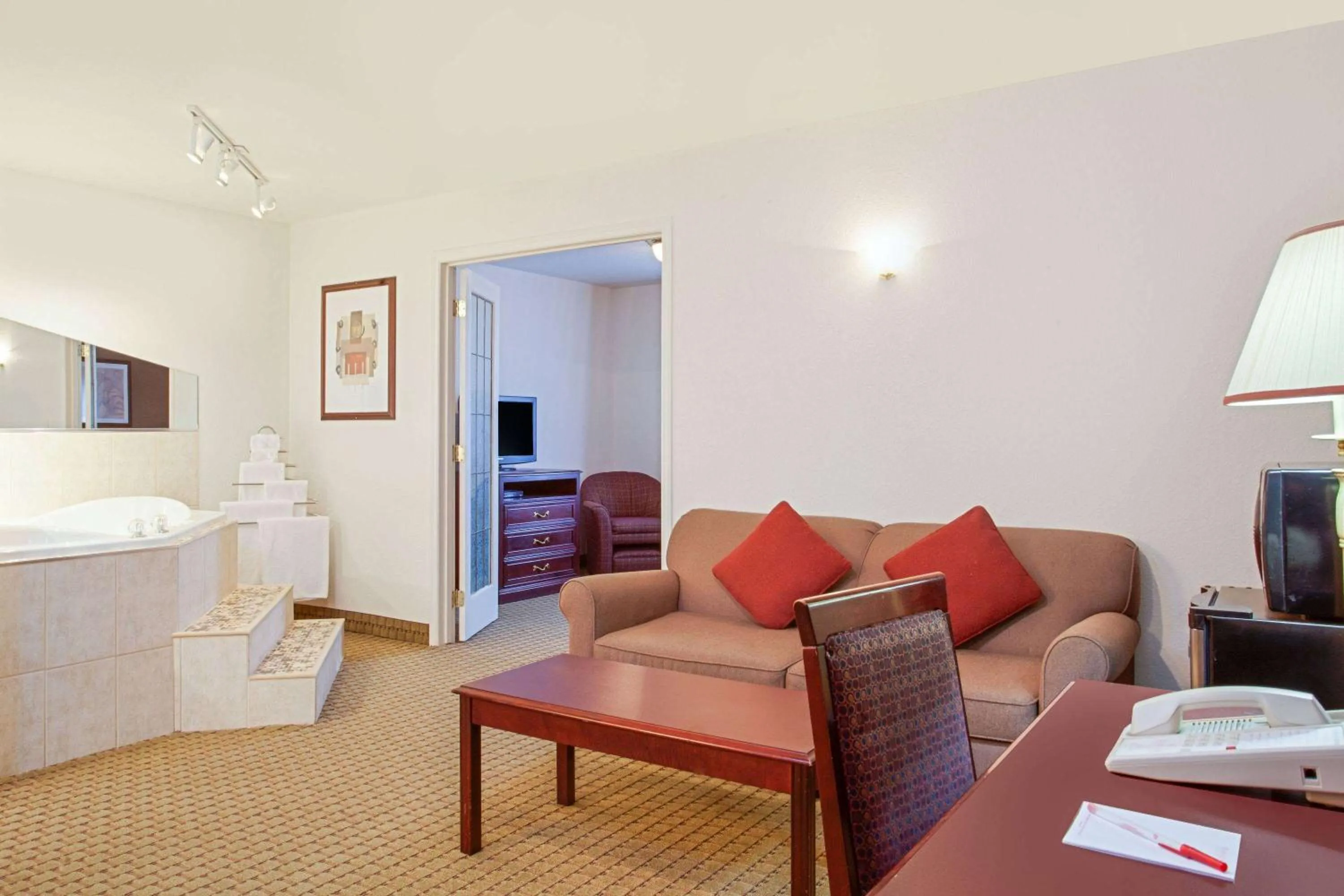 Bed in Ramada by Wyndham Red Deer Hotel & Suites