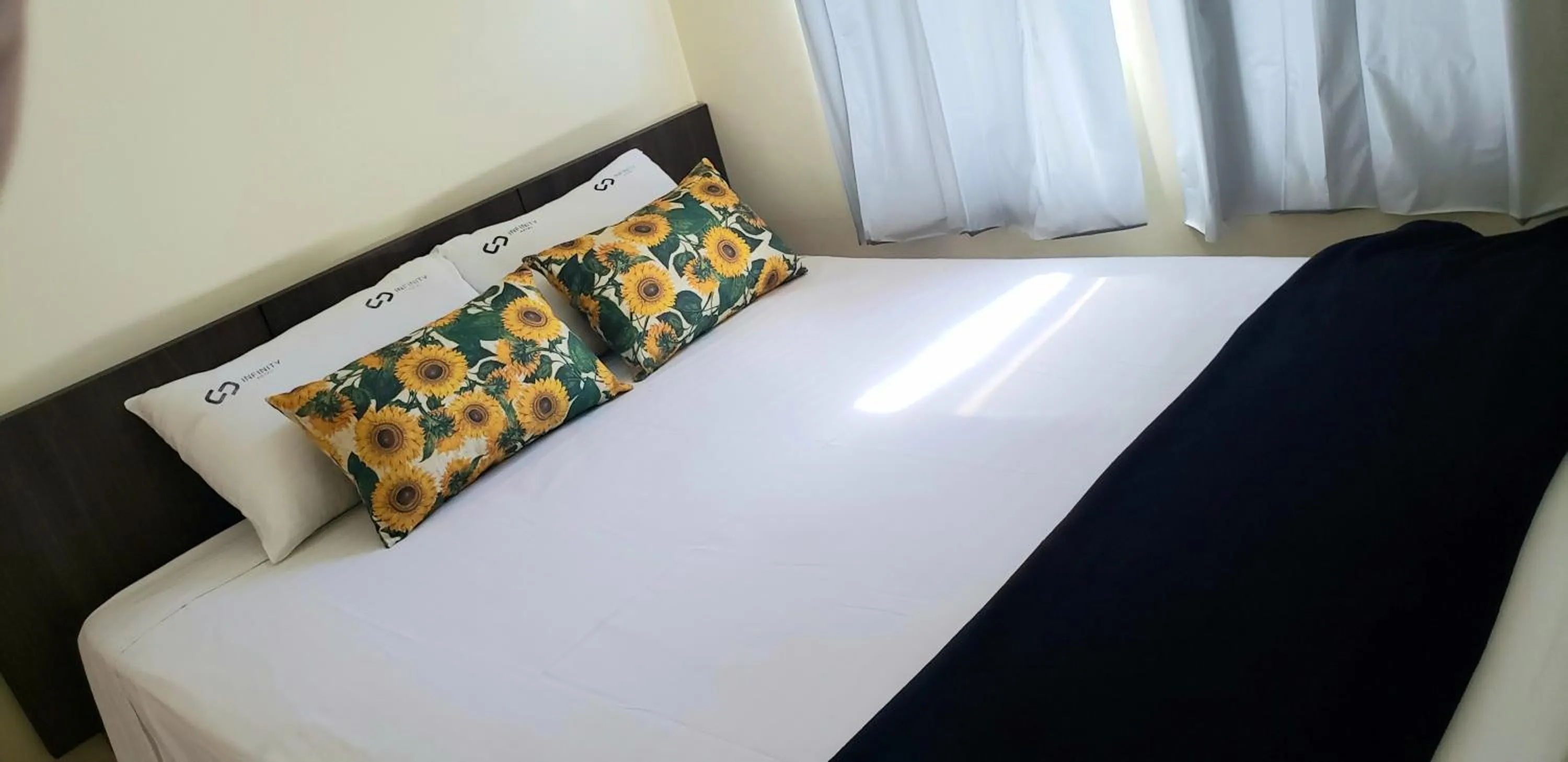 Bed in Infinity Hotel