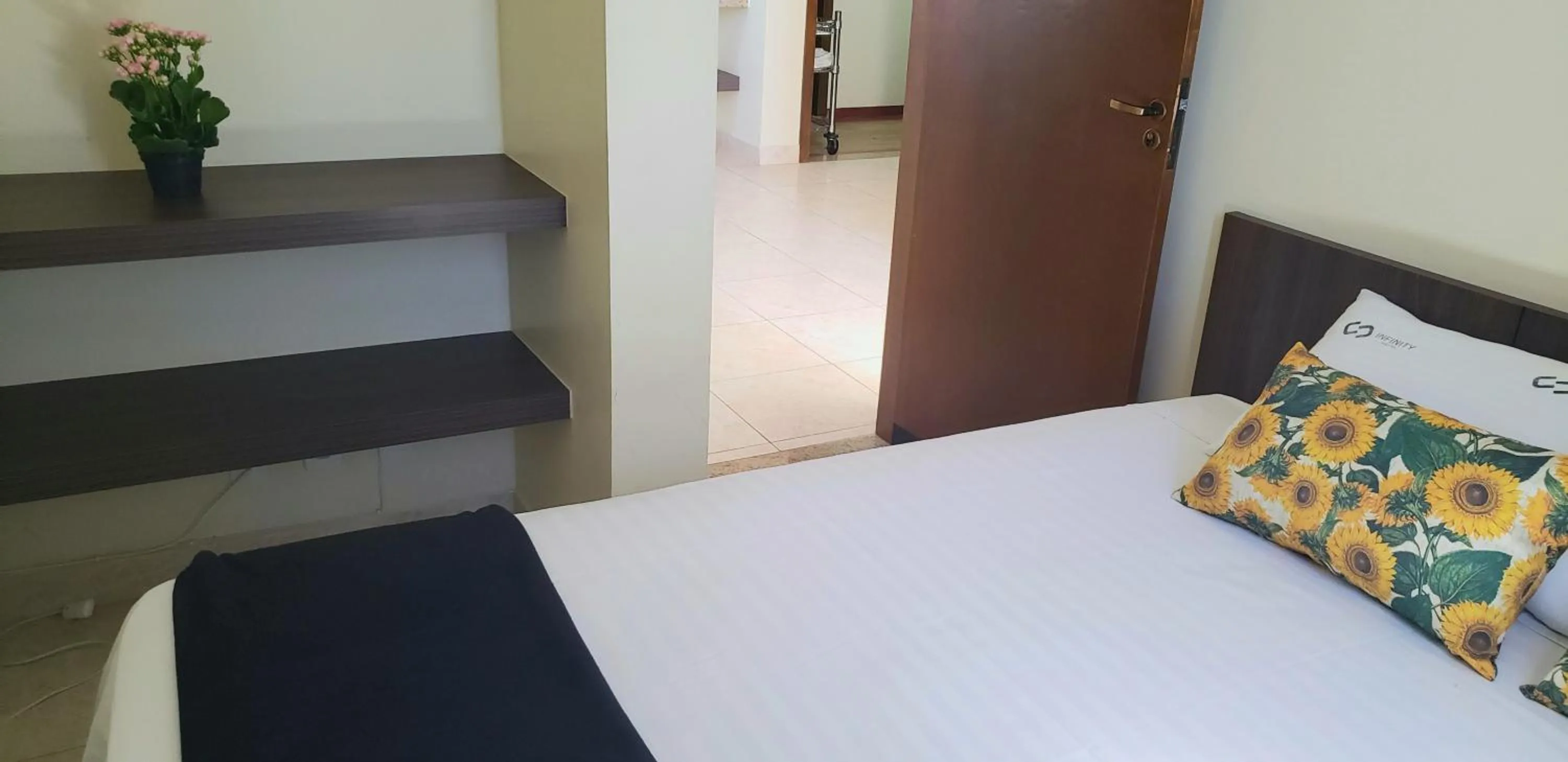 Bed in Infinity Hotel